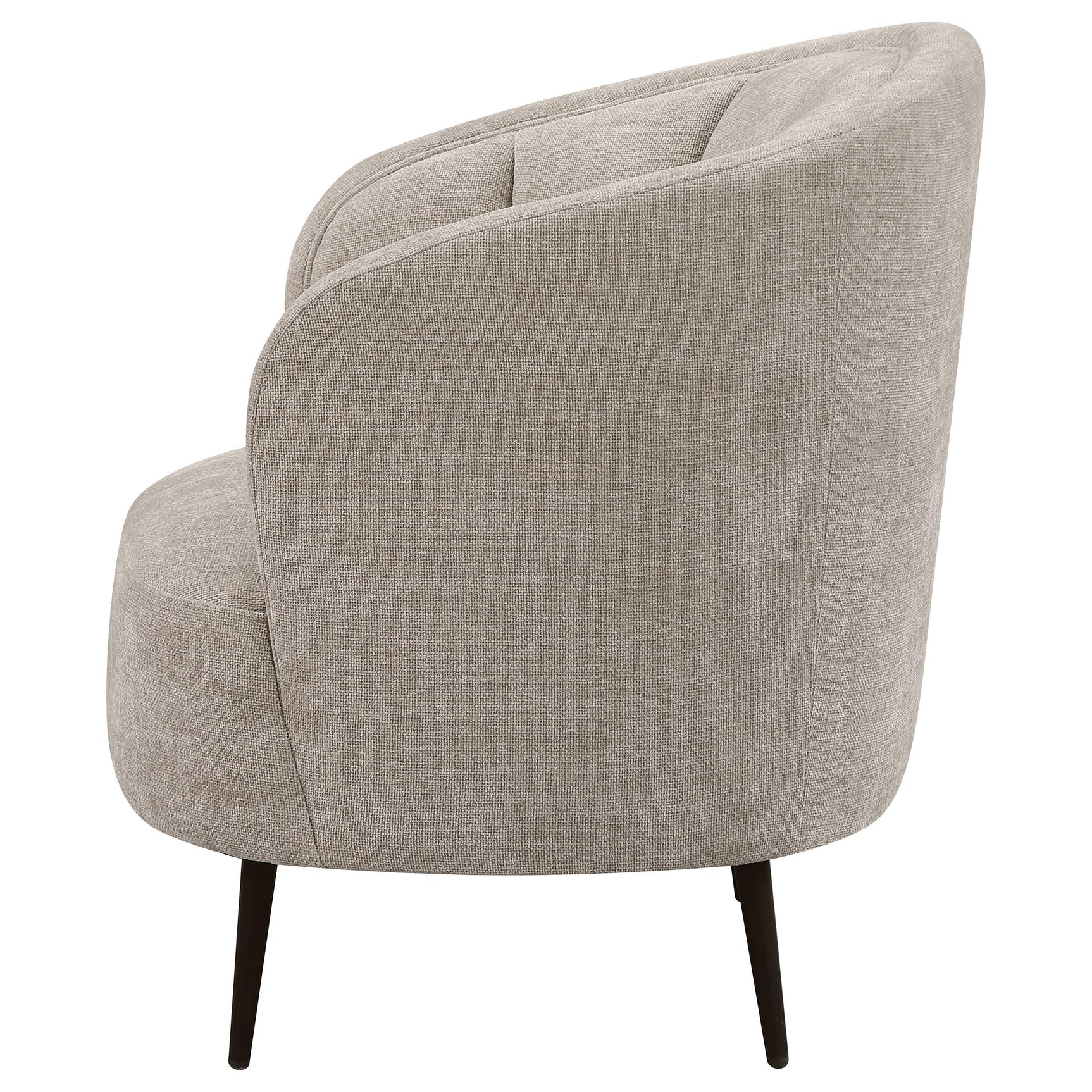 Detail of tapered black powder-coated metal legs on Ellorie chair