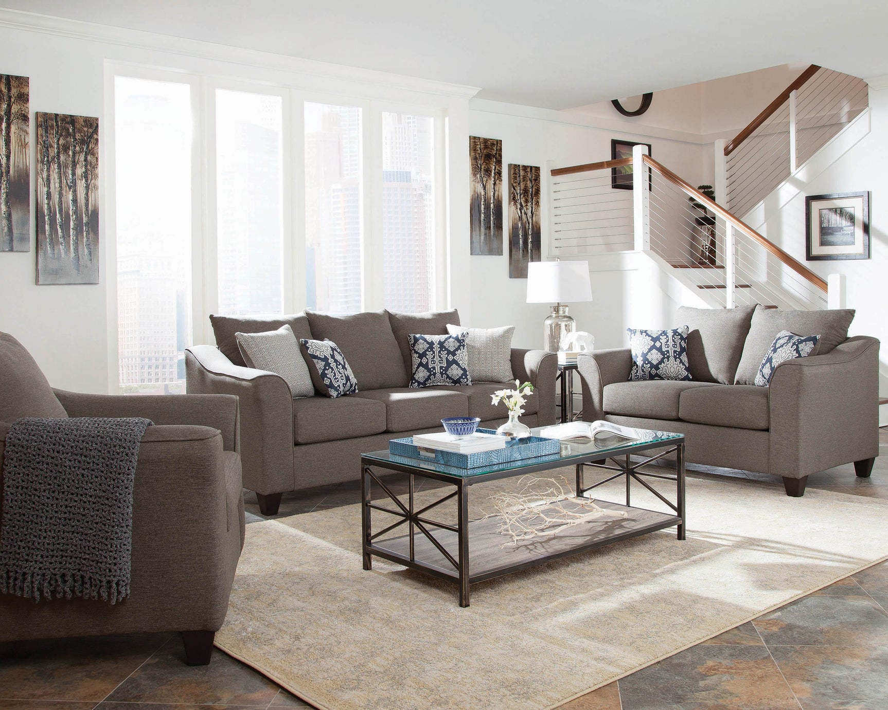 Salizar Grey Flared Arm Chair angled with flared arm detail