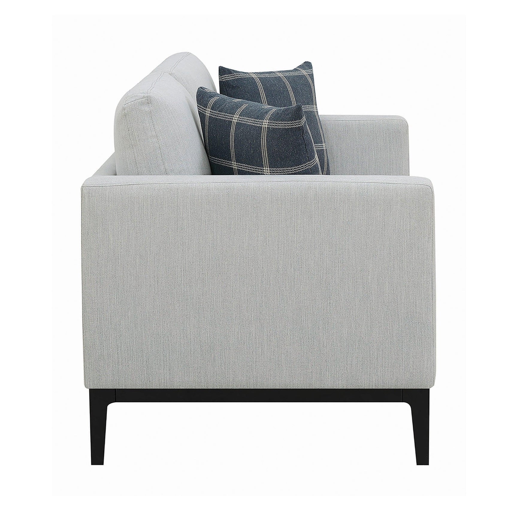 Side view of Apperson light grey loveseat with plaid pillows