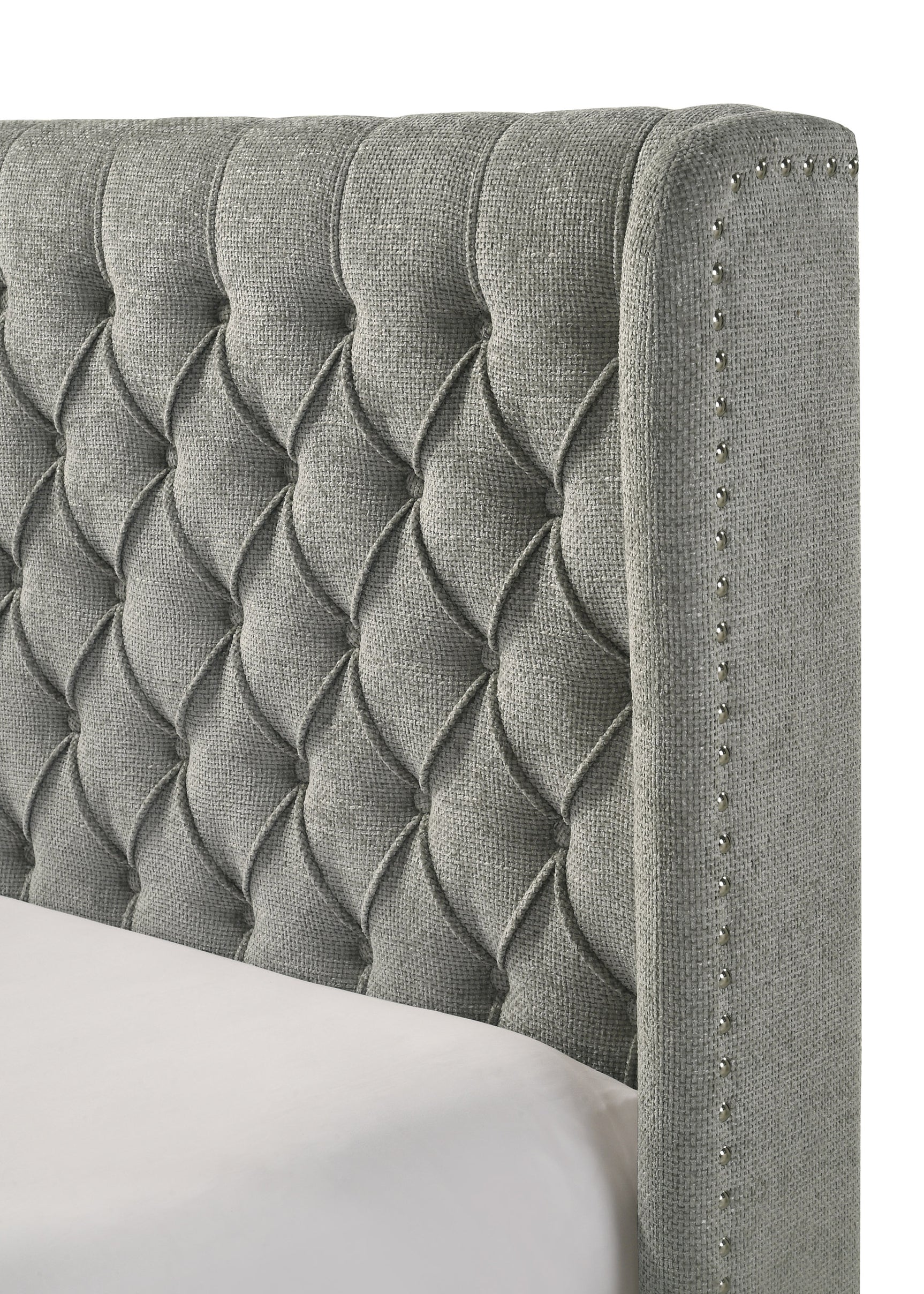 Close-up of tufted upholstery detail on headboard