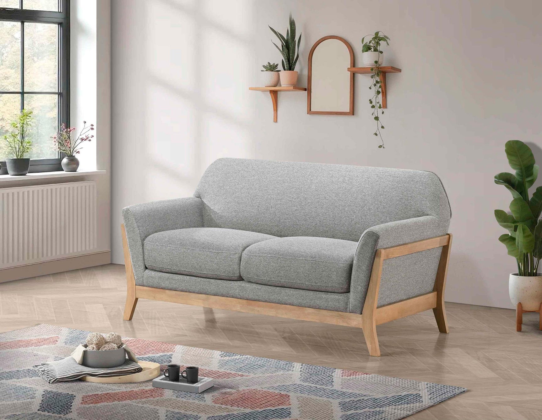 Vaughn loveseat side profile showing arched backrest