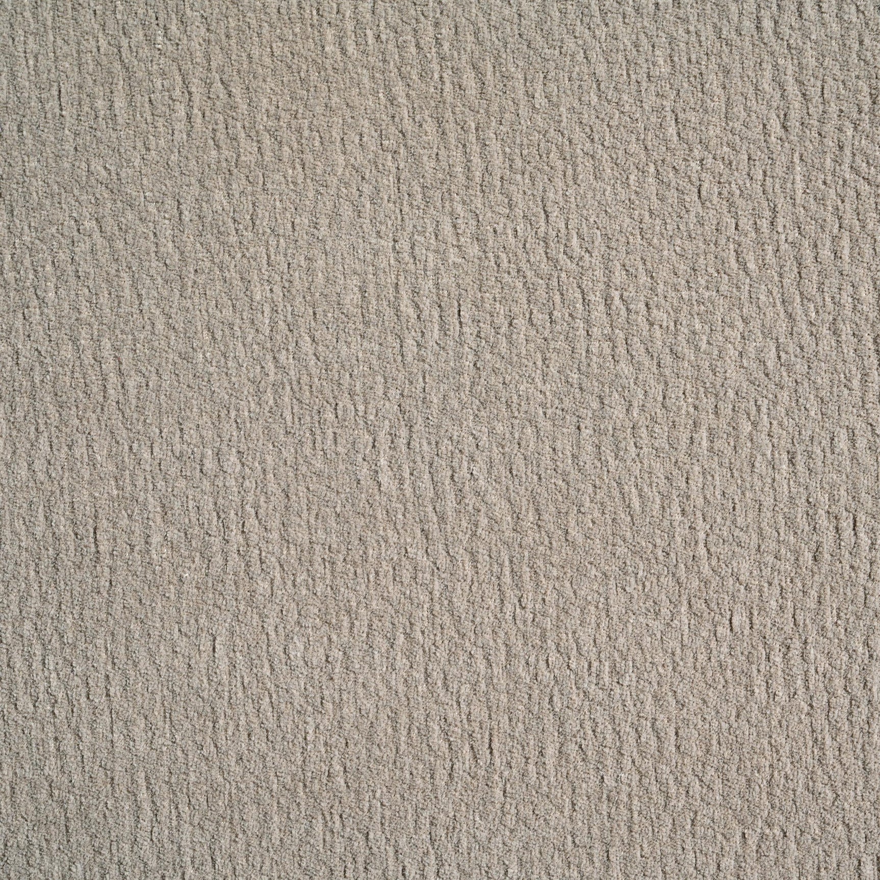 Close-up detail of sofa arm and fabric texture