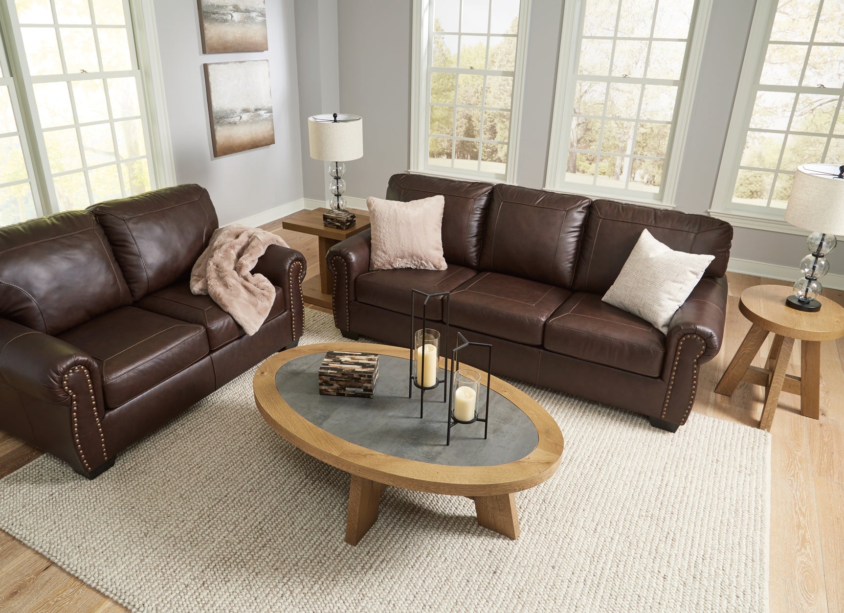 Side view of Colleton dark brown sofa and loveseat set