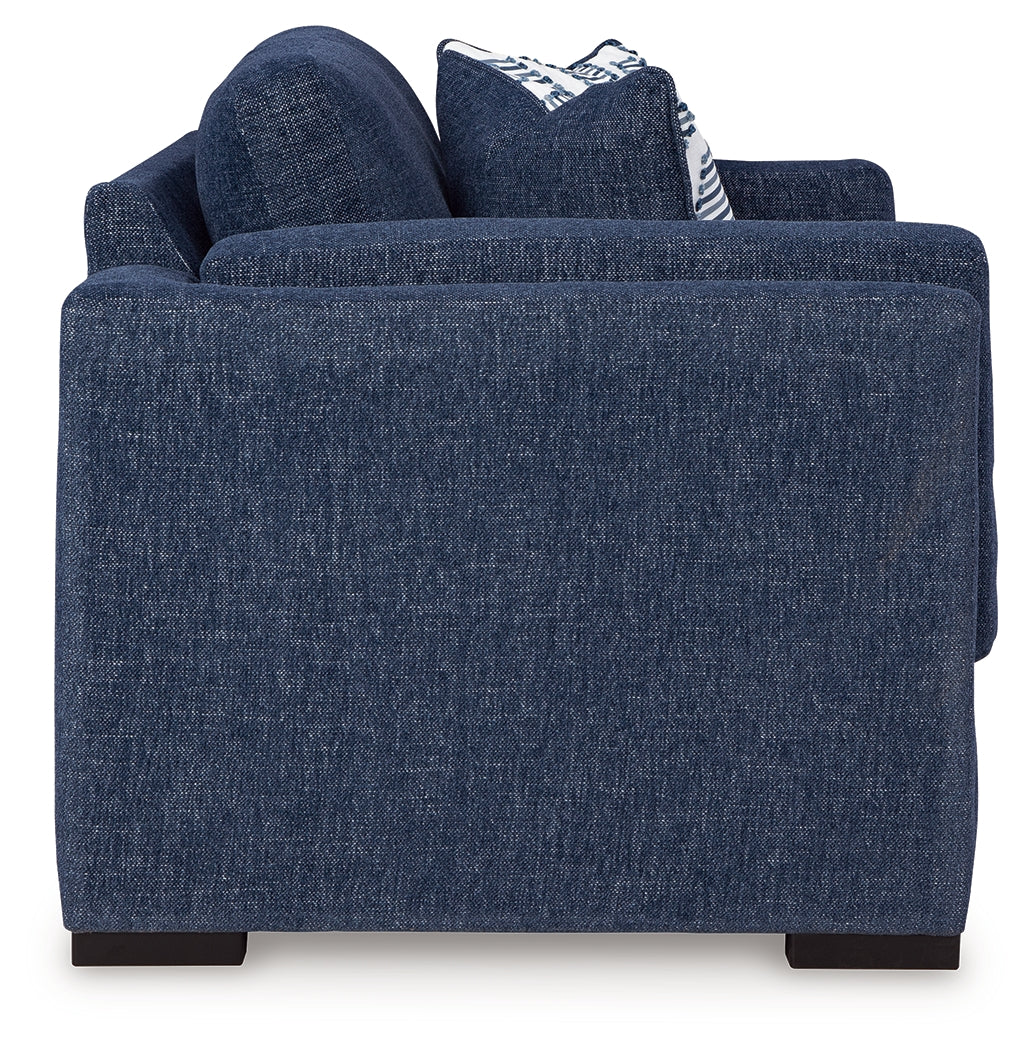 Close-up side detail of Evansley Navy Sofa and Loveseat