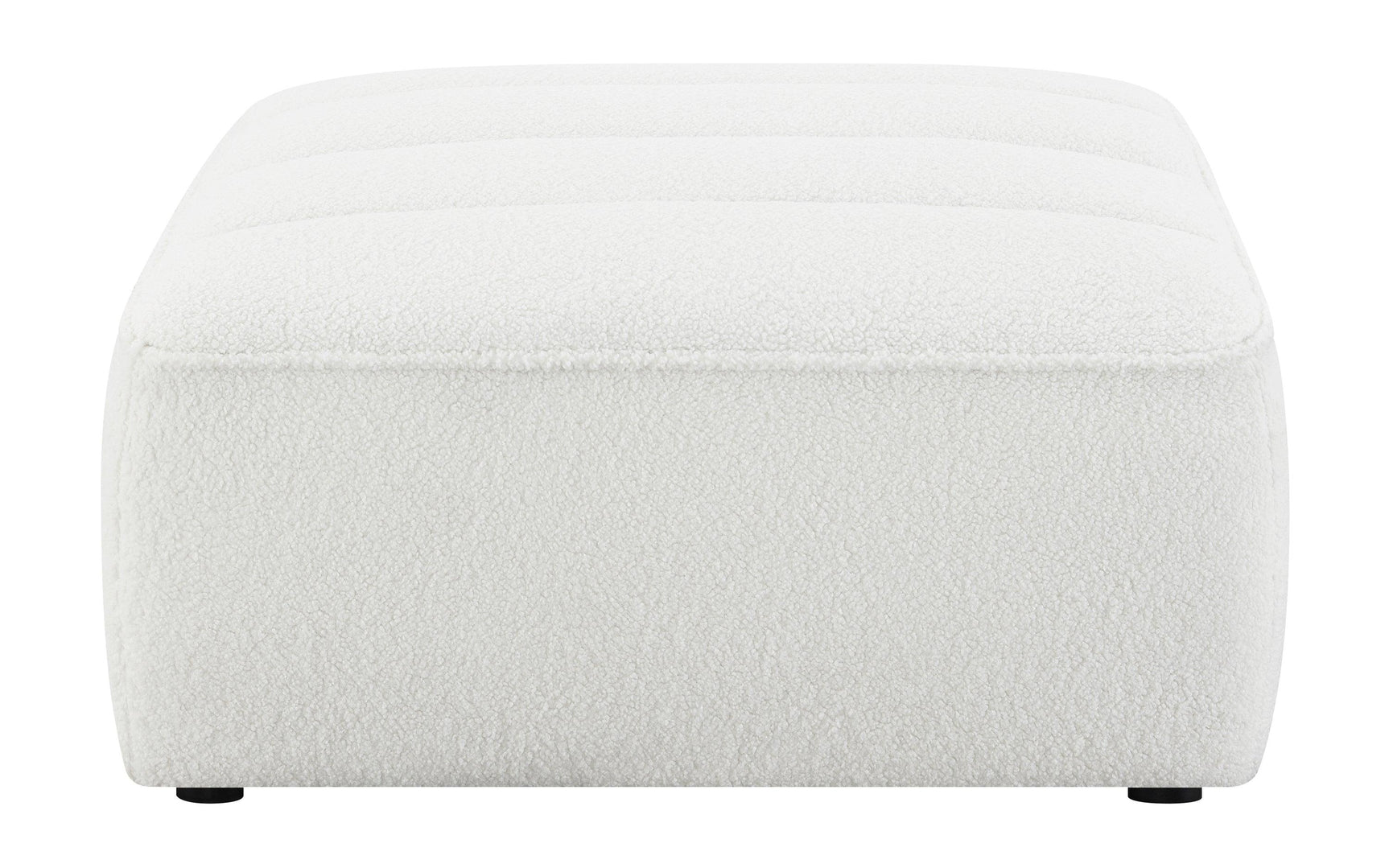 Sunny Ottoman side profile showing channel tufting