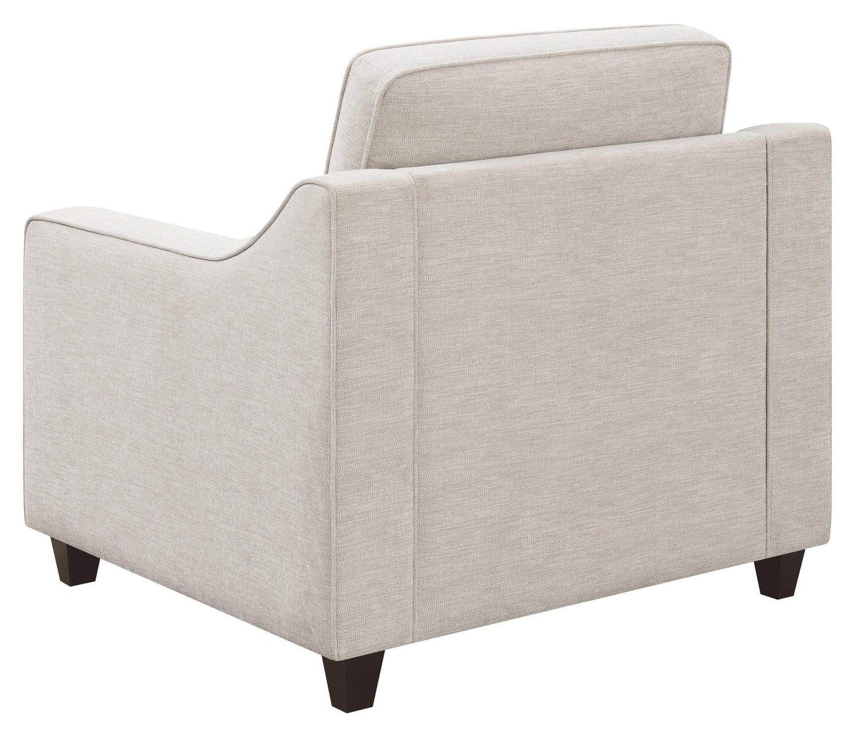Christine beige upholstered cushion back chair angled view
