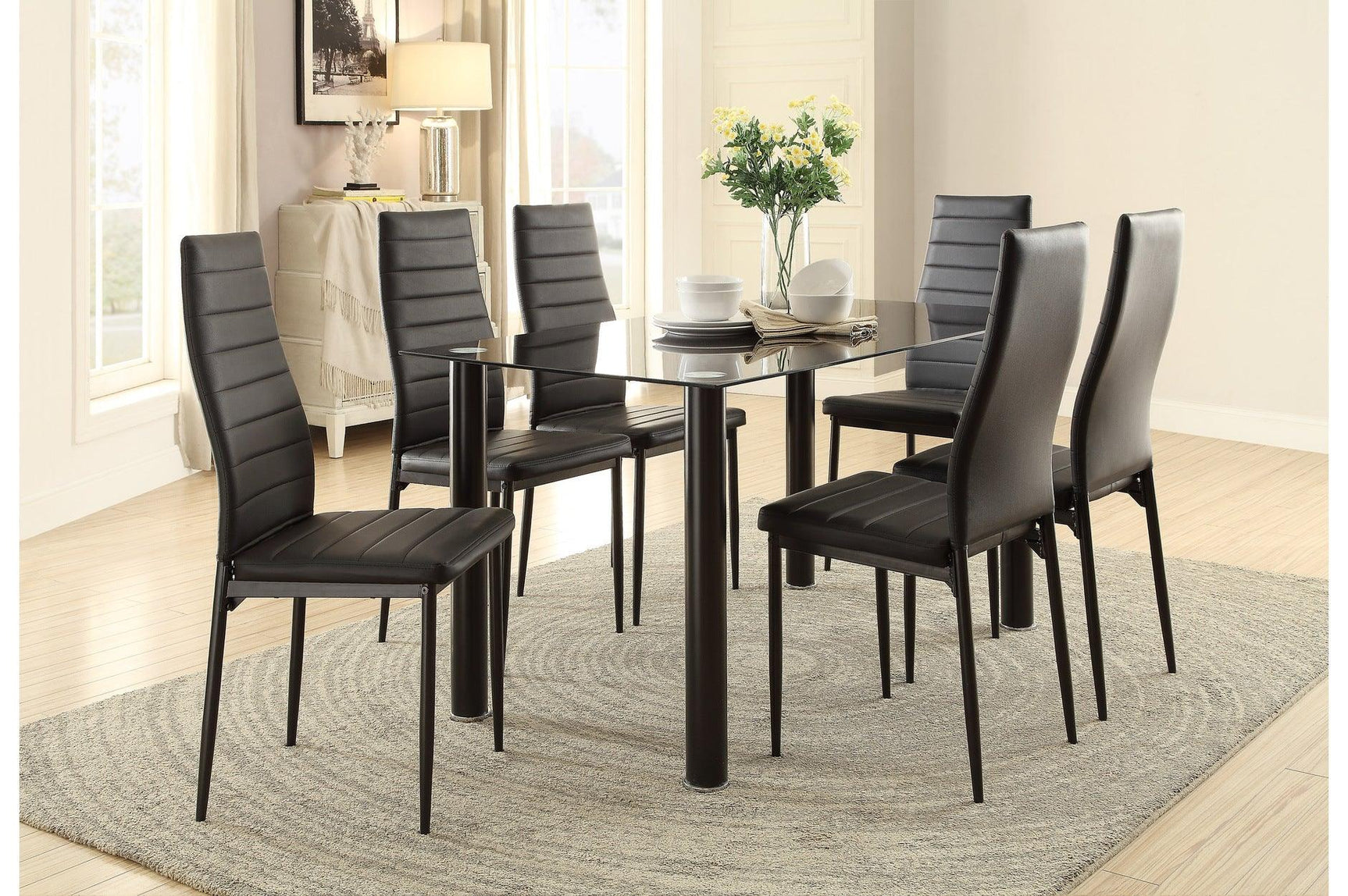 Room view showing Florian Glass Top Dining Set with black upholstered chairs