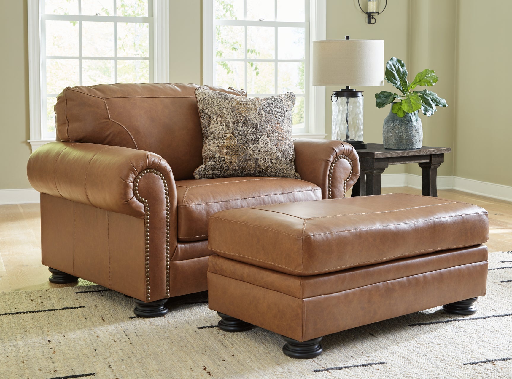 Carianna Caramel sofa set including loveseat, chair, and ottoman