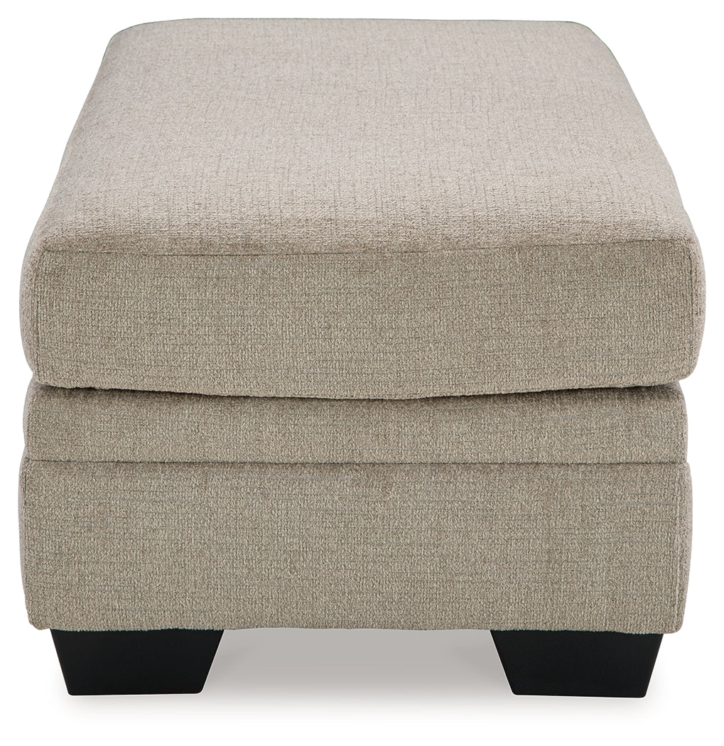 Close detail view of chair upholstery in taupe color