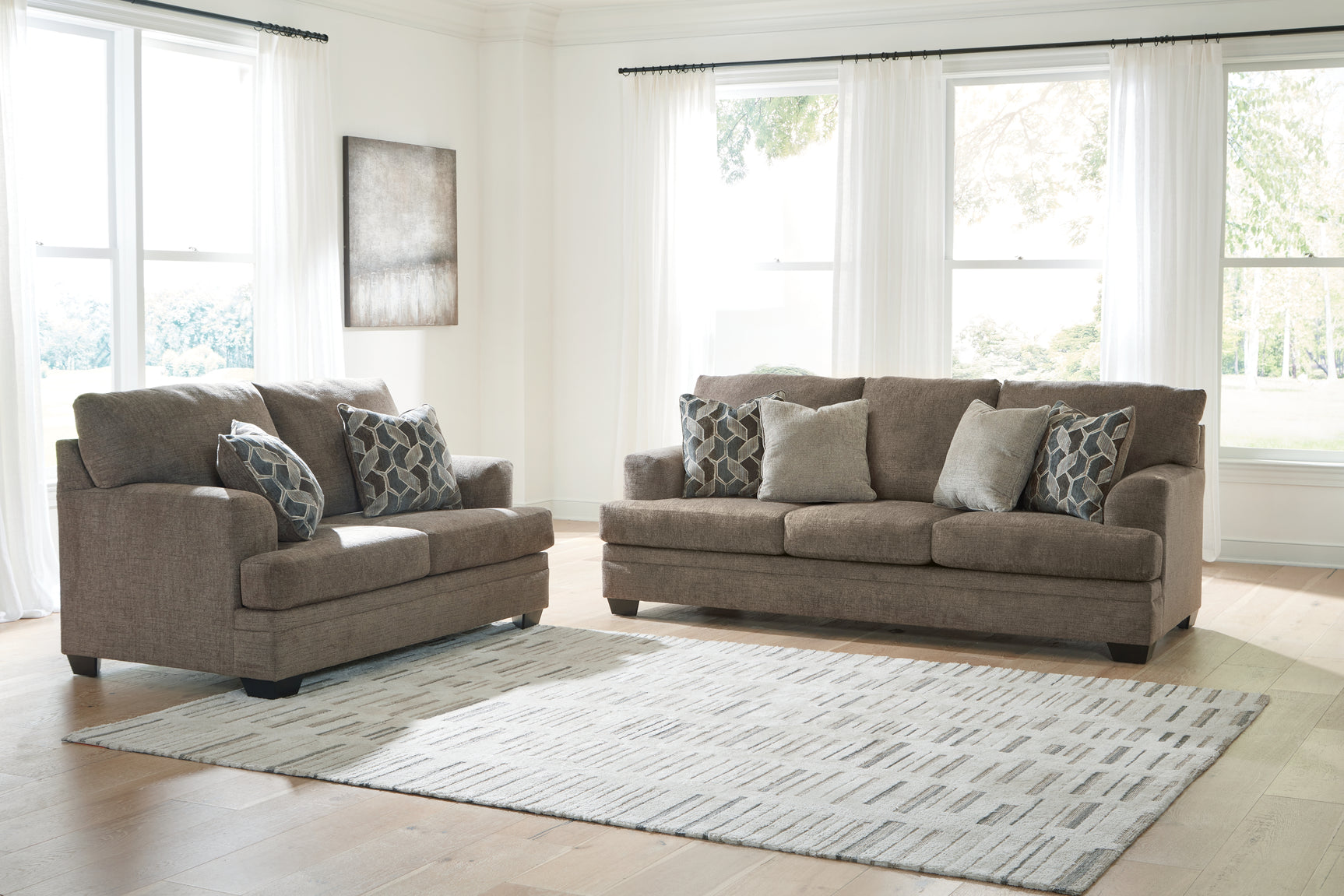 Stonemeade Nutmeg Sofa, Loveseat, Chair, and Ottoman set angled view