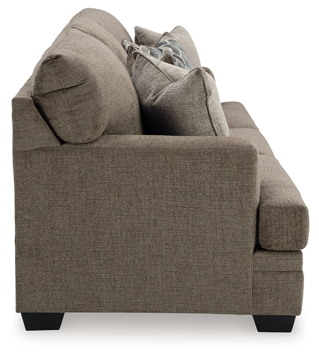 side close-up of chair armrest in Nutmeg fabric