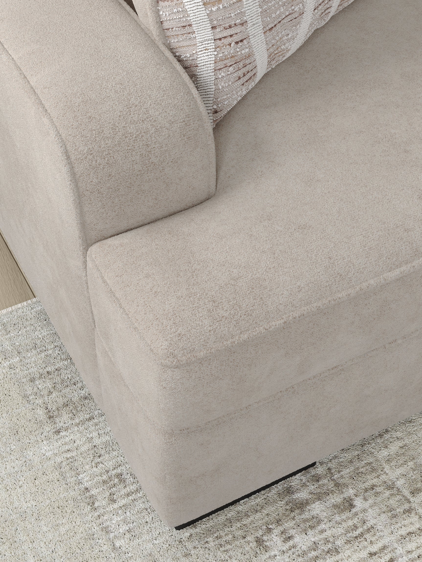 Close-up detail of chenille fabric upholstery and stitching