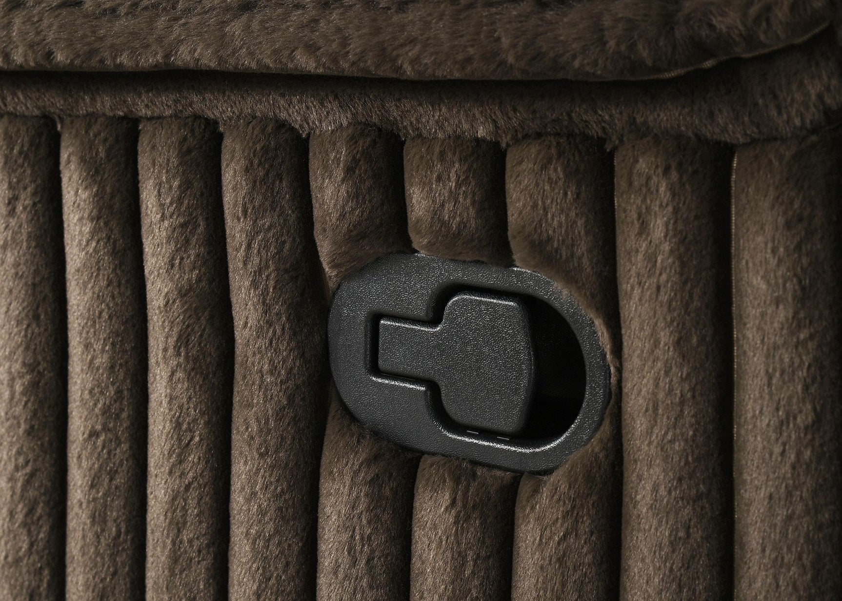 Sectional sofa corner angle showing stitching details