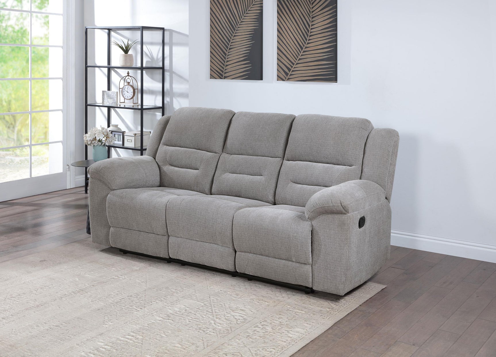 Side view of Grimm Gray Manual Reclining Sofa upholstery and storage compartment