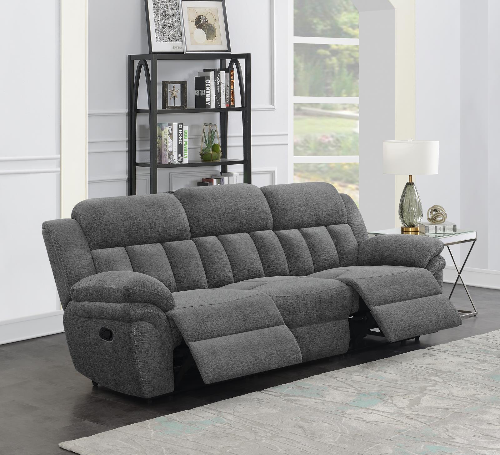 Bahrain grey upholstered motion reclining sofa side angle