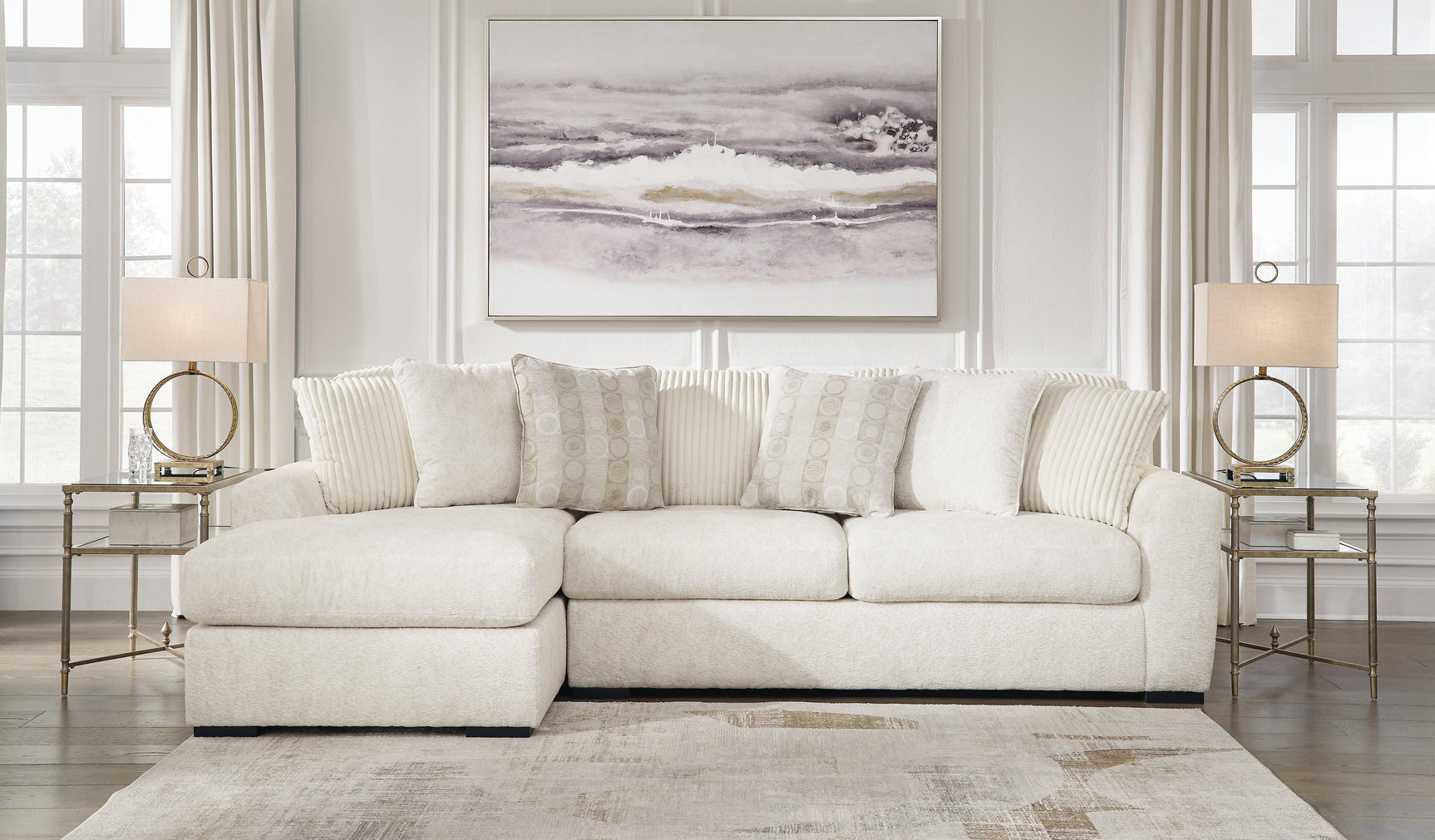 Close-up detail of Chessington Ivory 2-Piece Sectional Sofa fabric and chaise