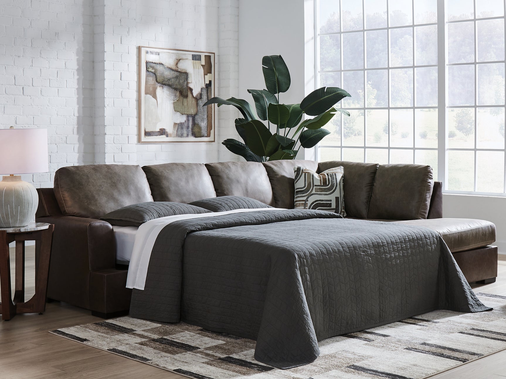 Room view showing Castille Way Fossil sleeper sectional with chaise