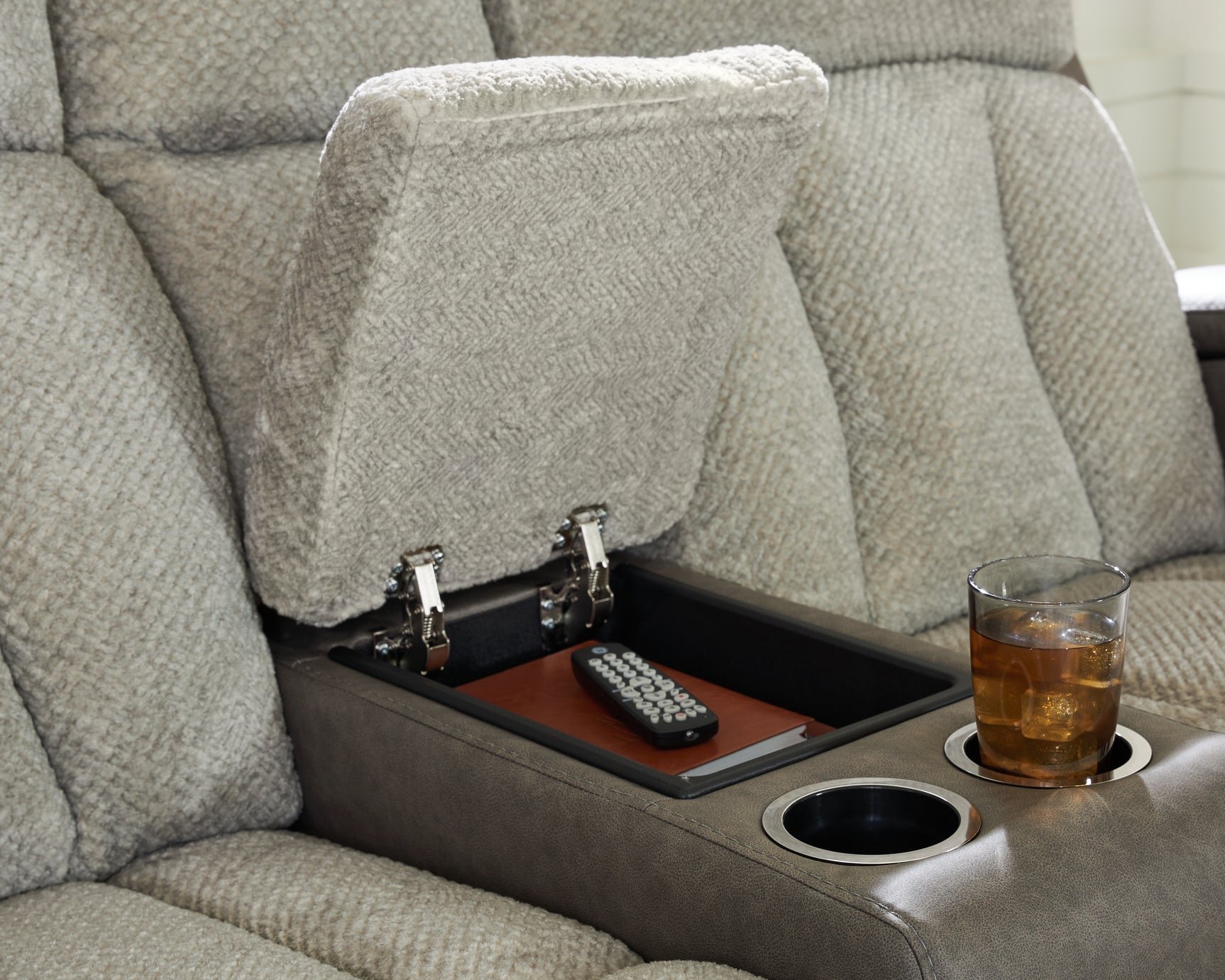 Detailed view of center console with storage and cup holders