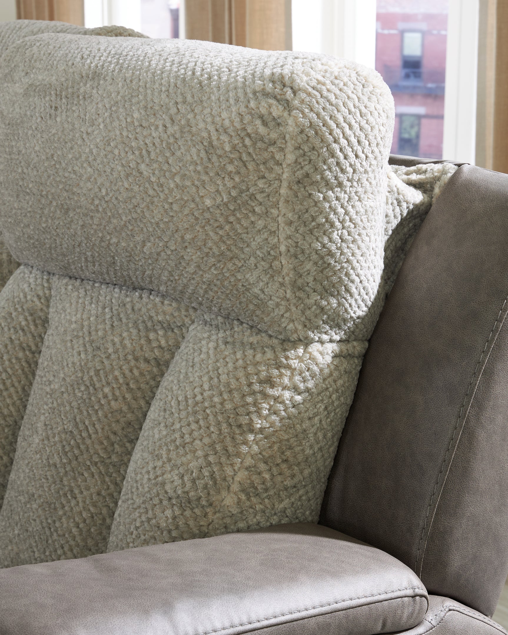 Extended footrest on sofa recliner