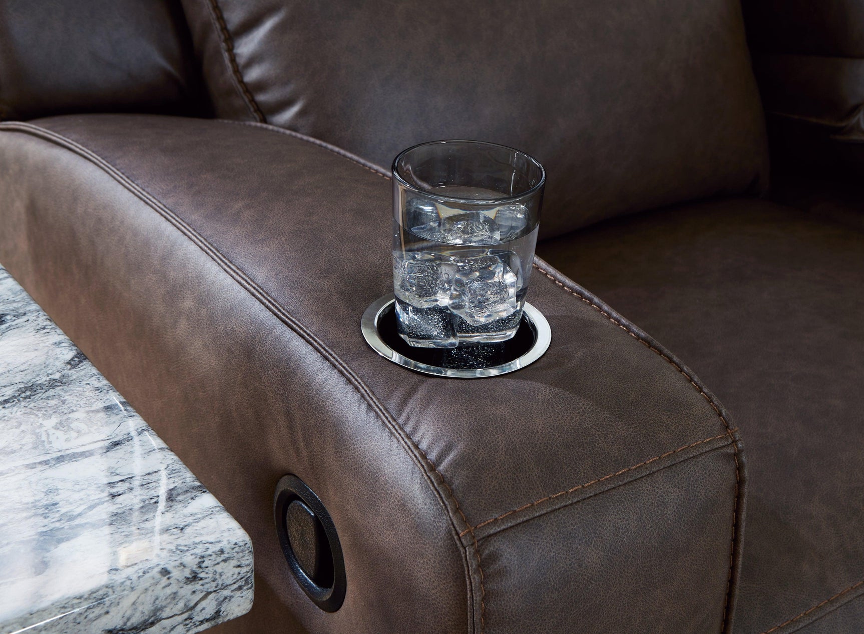 Drop-down table with cup holders and USB ports on Lavenhorne Sofa