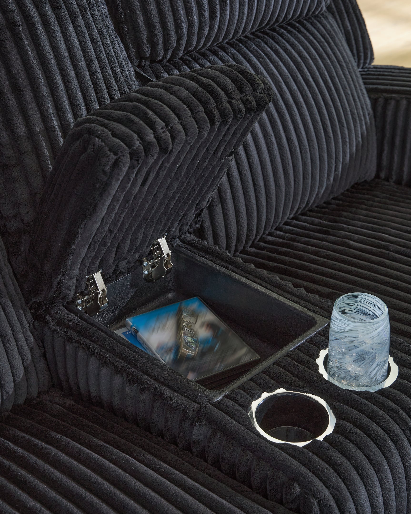 Console storage and cup holders on Forest Lake loveseat
