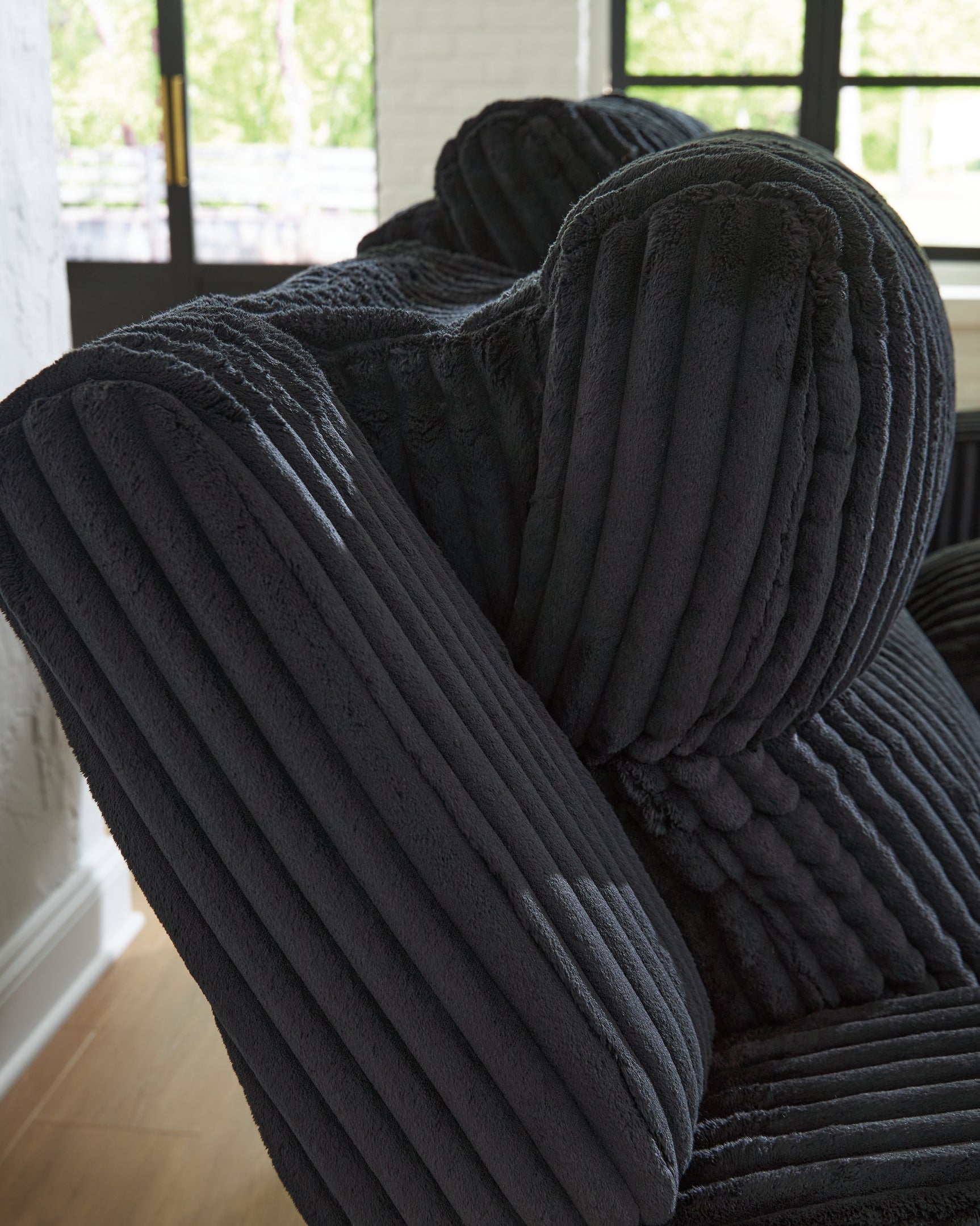 Adjustable power headrest on Forest Lake loveseat
