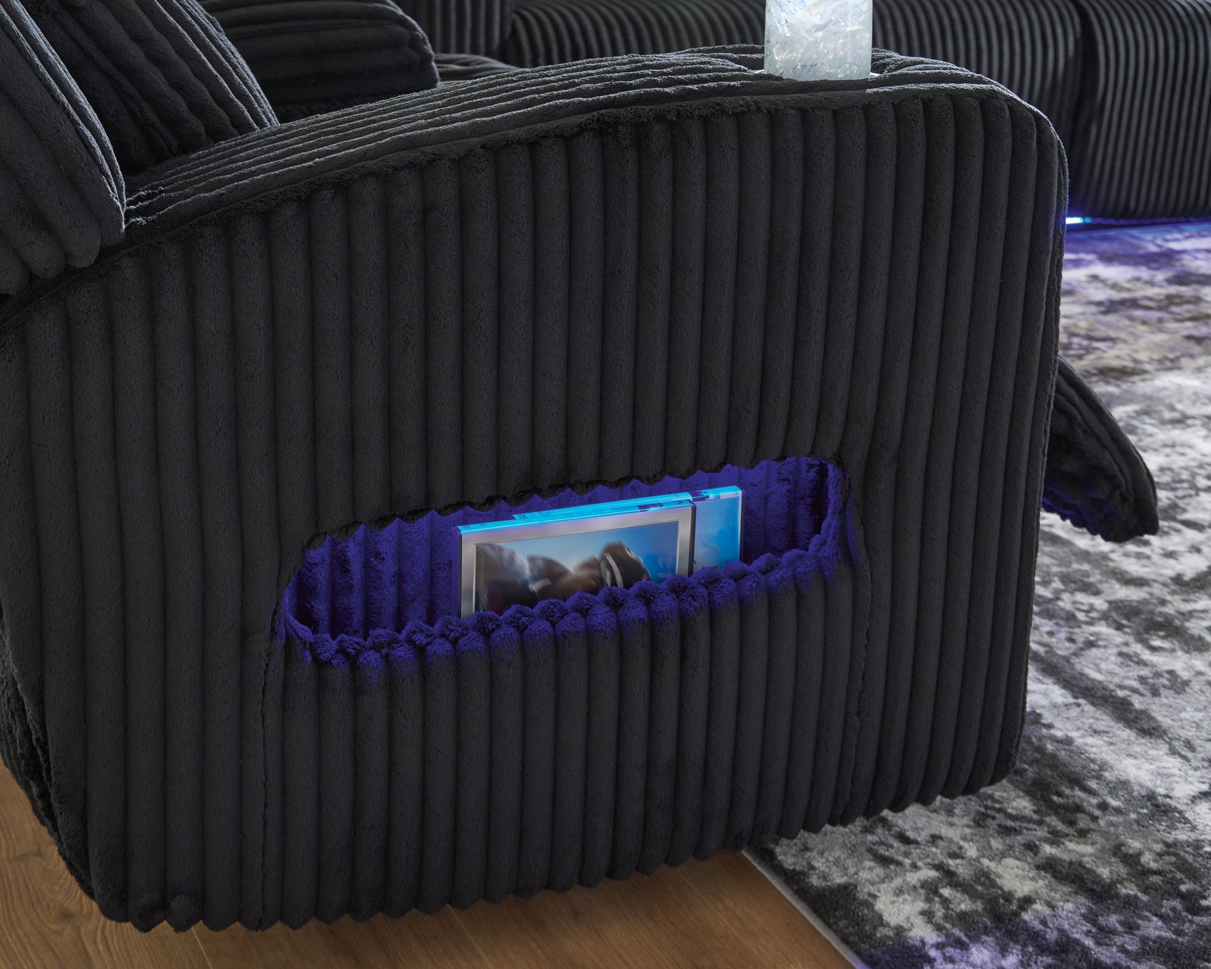 LED lighting feature under armrest
