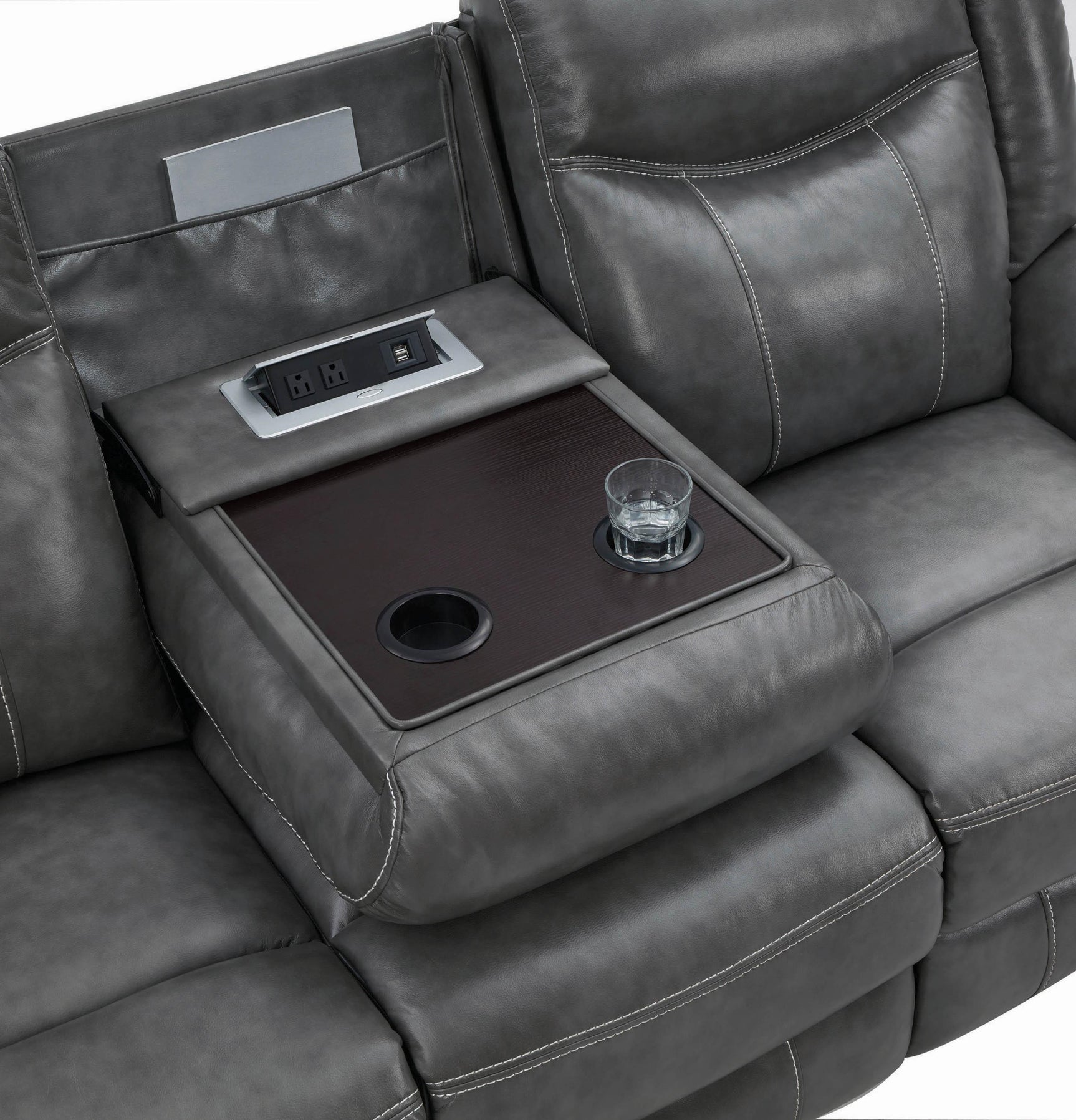 Recliner sofa in living room setting with Houston cityscape