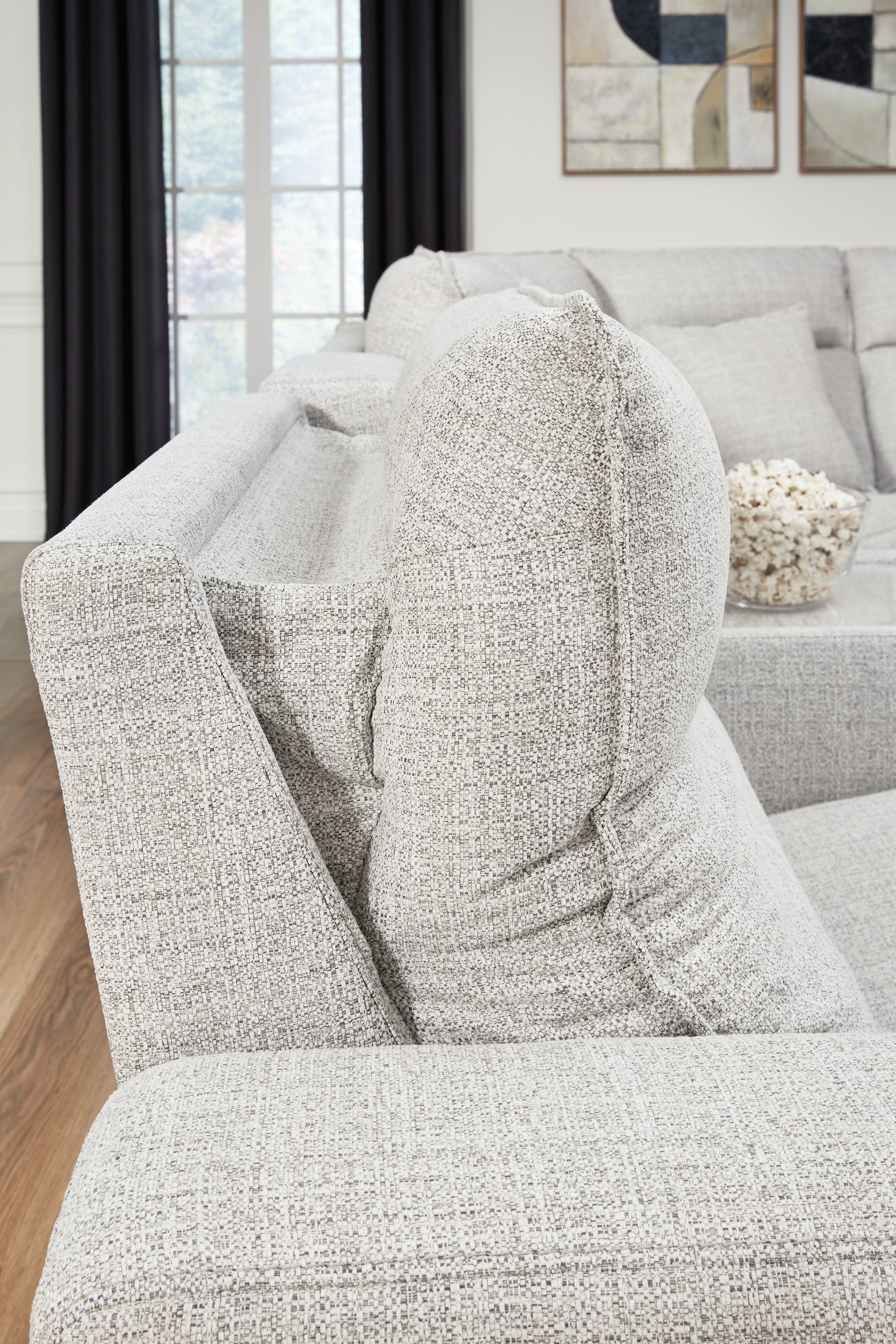 Modmax II sectional showing Easy View™ adjustable headrest feature
