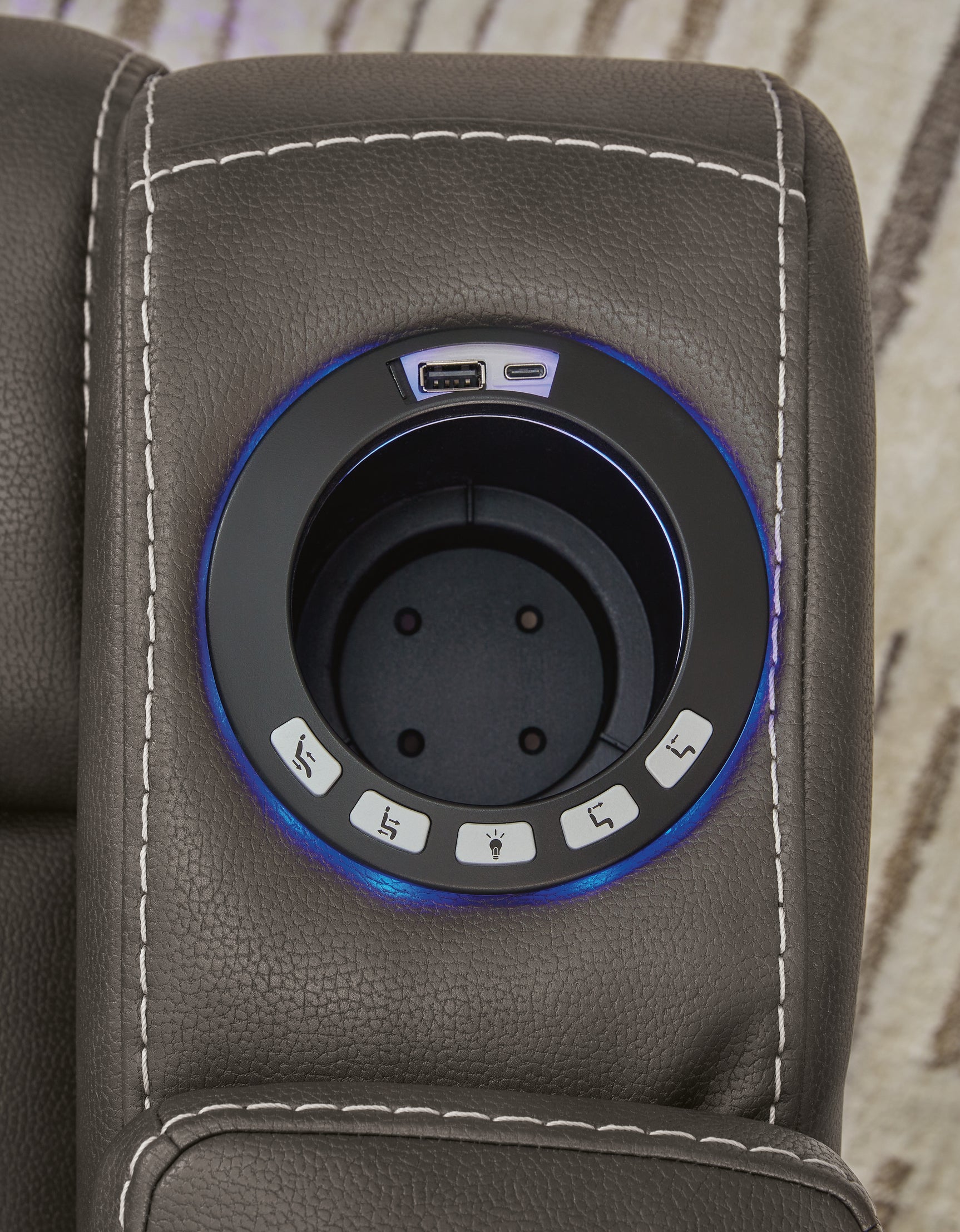 USB charging port and cup holder detail