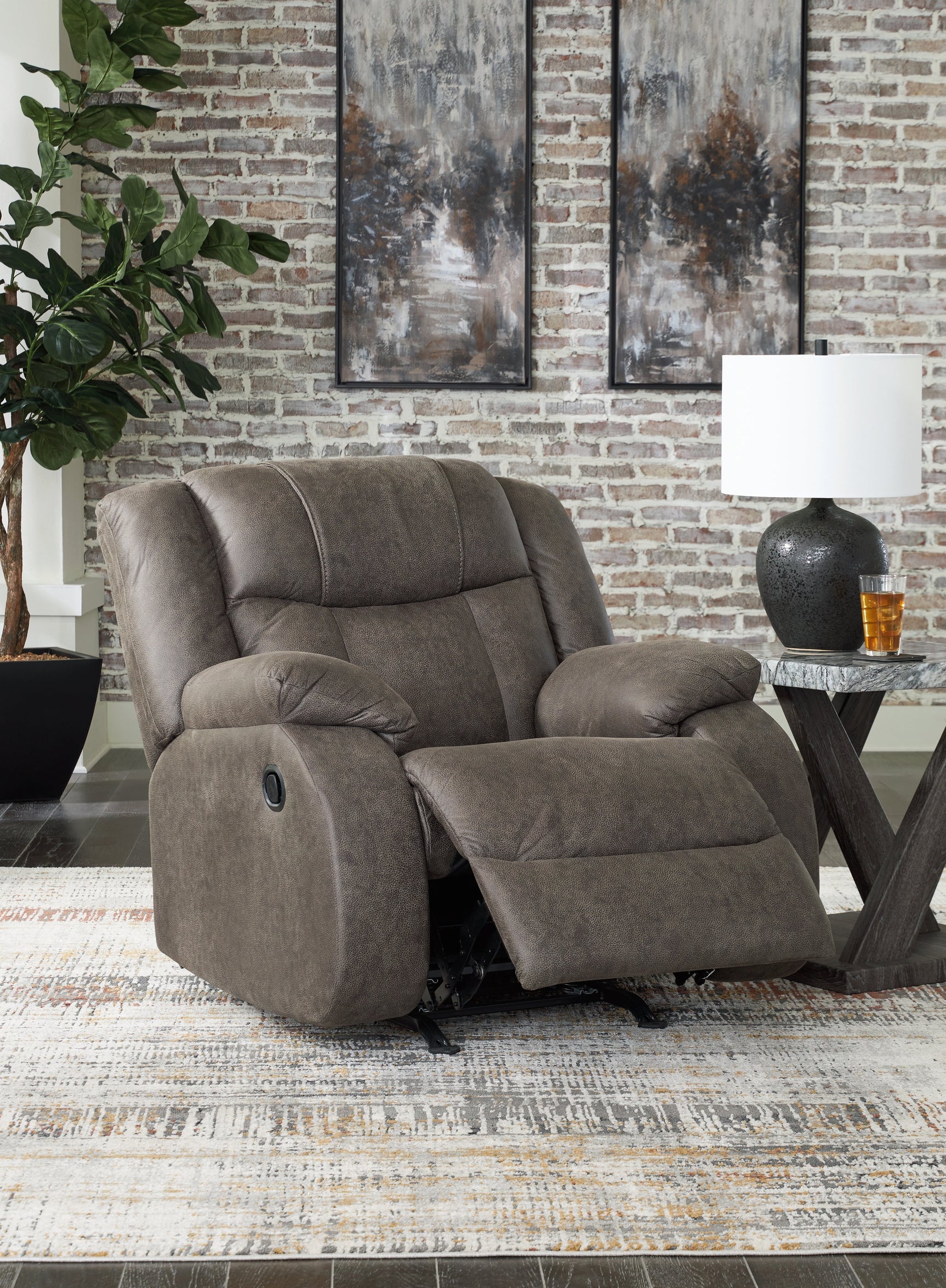 Side view with recliner open of First Base Gunmetal Faux Leather Recliner