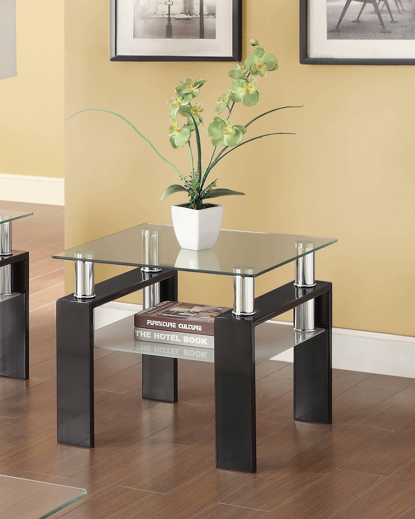 Side angle of Dyer tempered glass end table with black metal legs and shelf