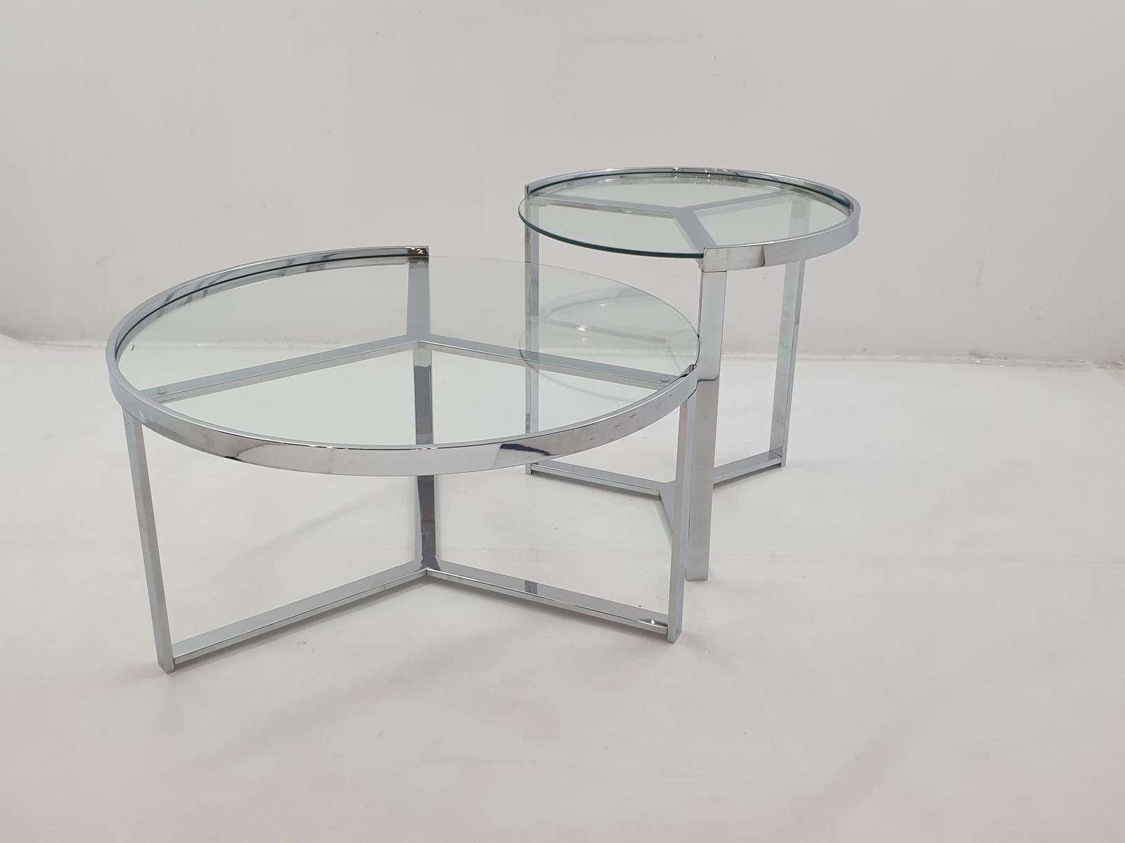 Delia 2-piece round glass top nesting coffee tables, side view with chrome frames