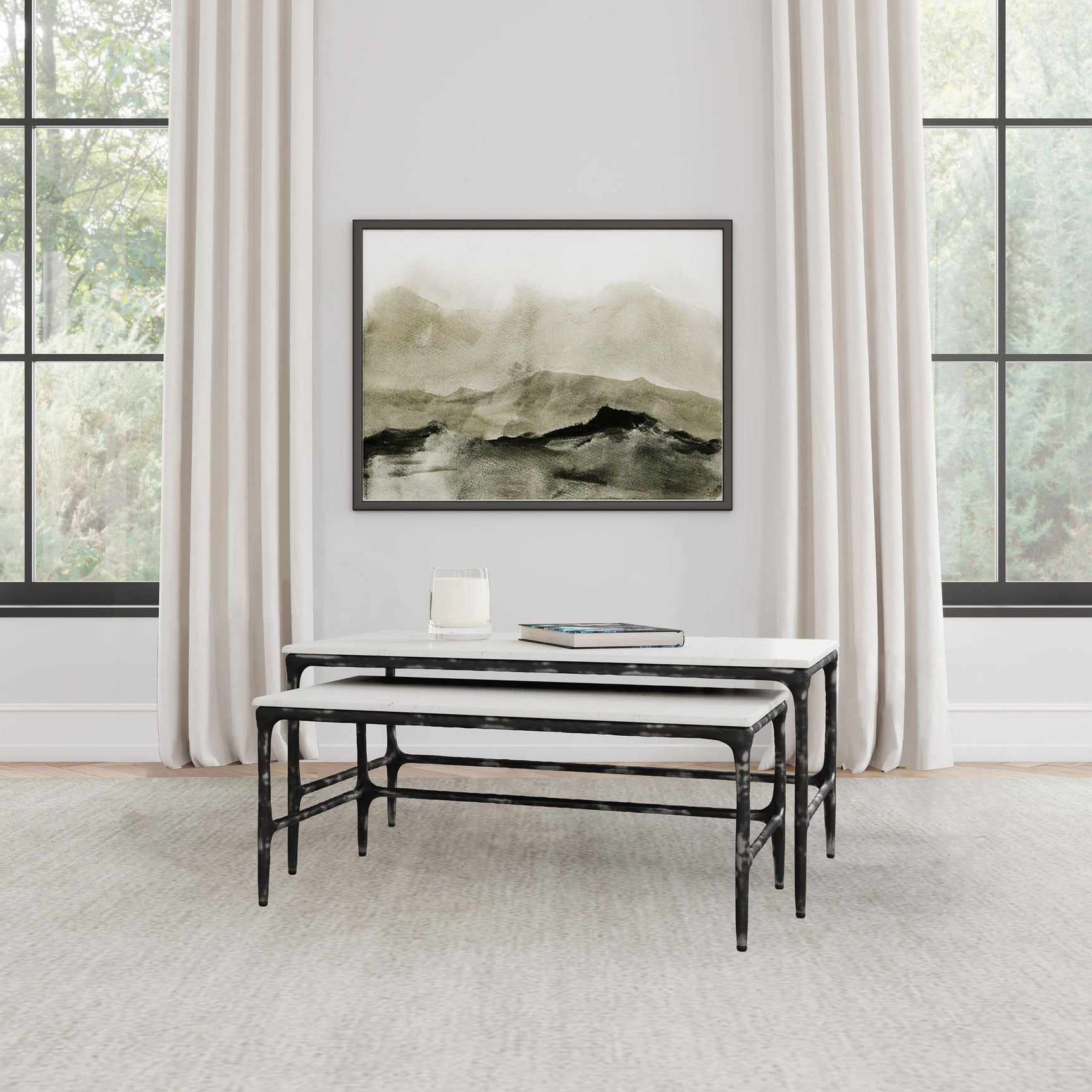 Ebby nesting coffee tables side angle showing marble surface and black iron frame