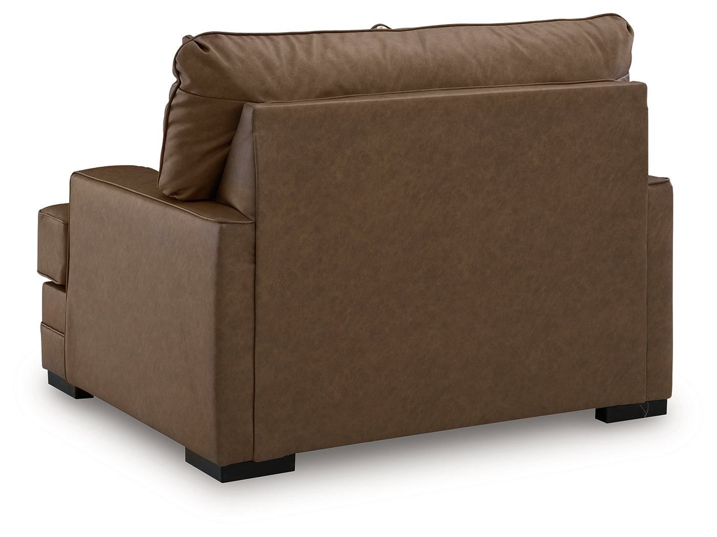 VillaCourt oversized chair close-up of caramel faux leather texture
