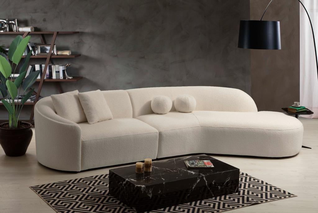 Detail view of ivory boucle textured fabric on Ava Sectional