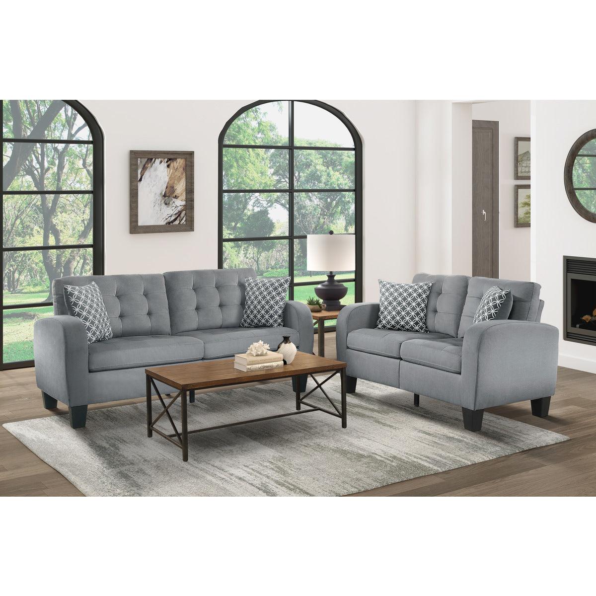 Sinclair Gray Loveseat with decorative pillows displayed