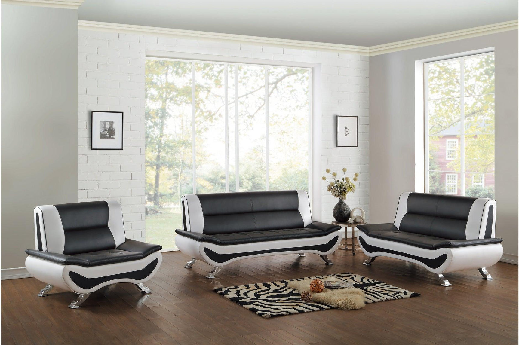 Side view of Veloce black and white faux leather tufted sofa