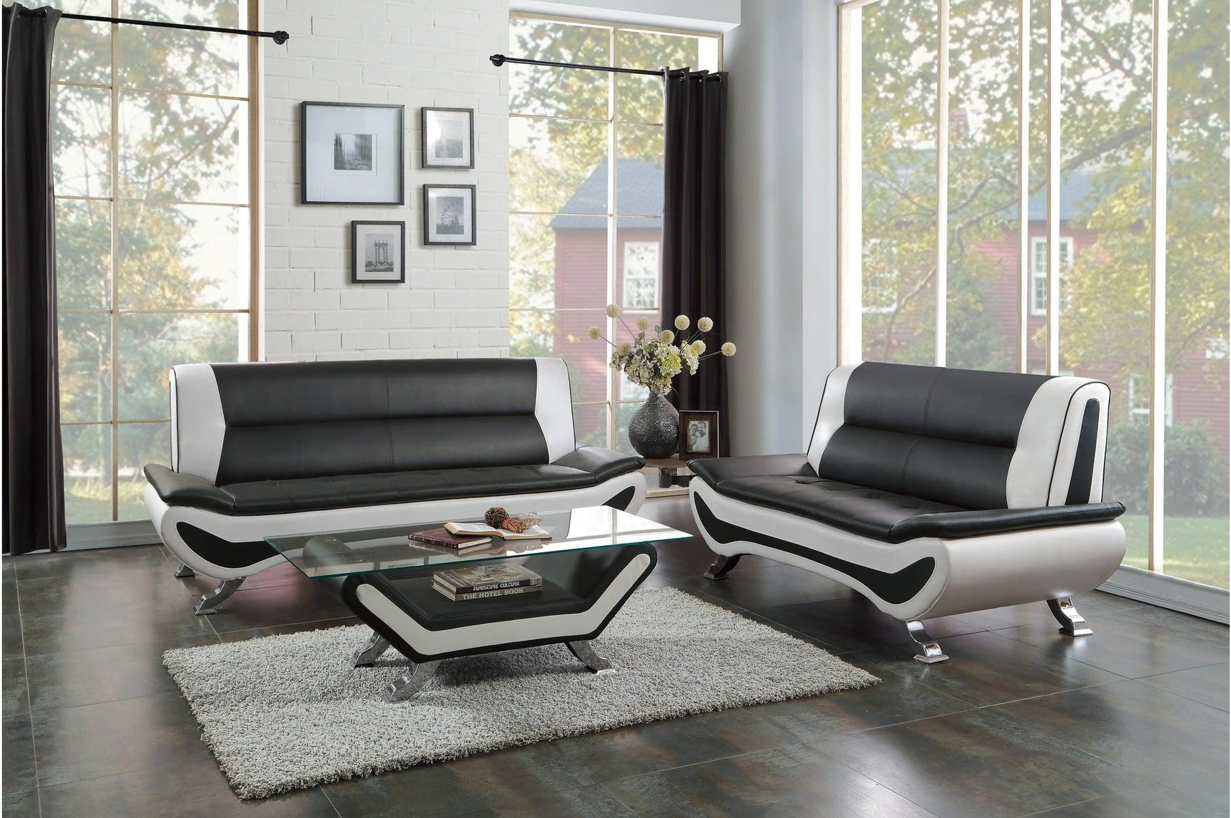 Main view of Veloce black and white faux leather tufted sofa and loveseat set