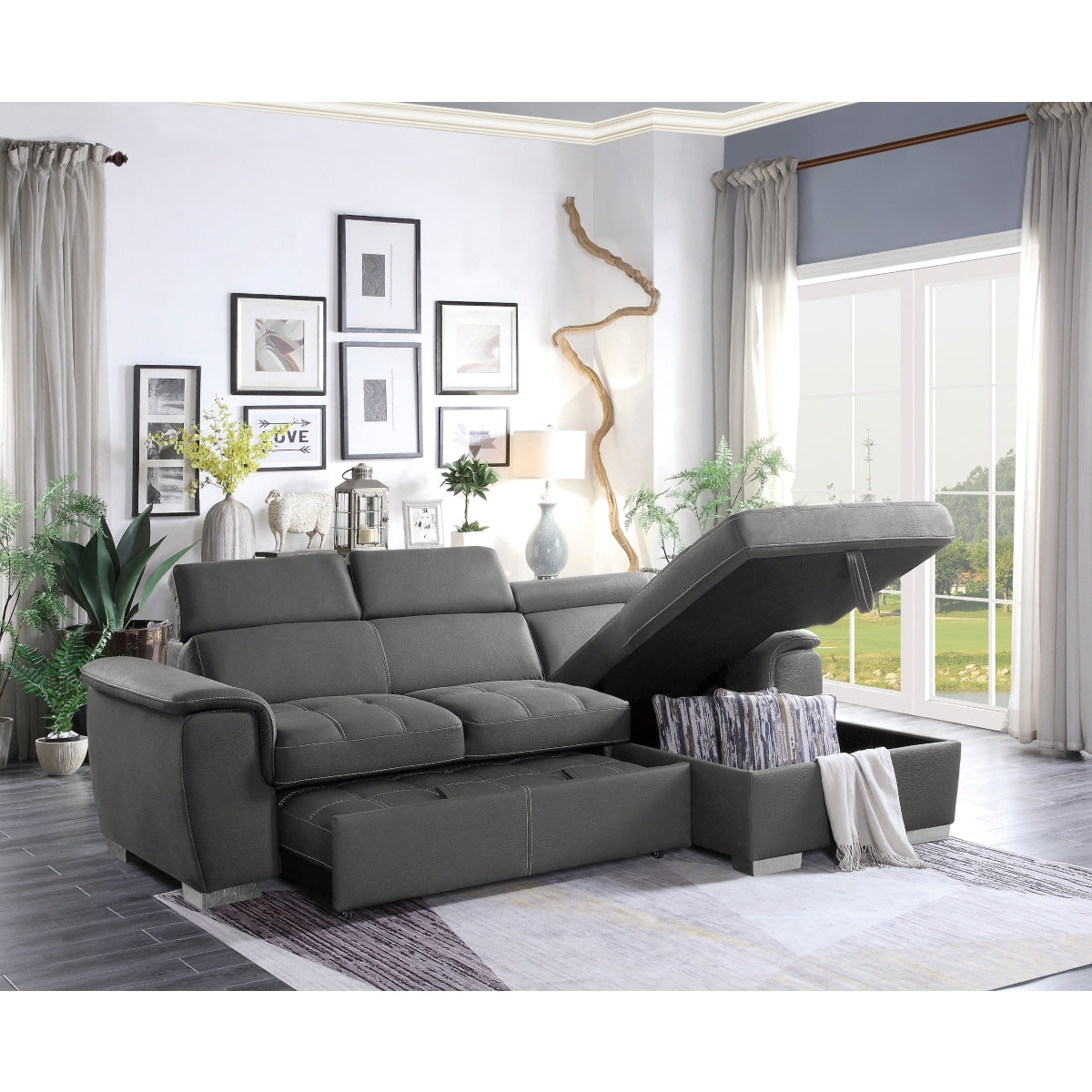 Open sleeper bed on Ferriday Gray sectional sofa