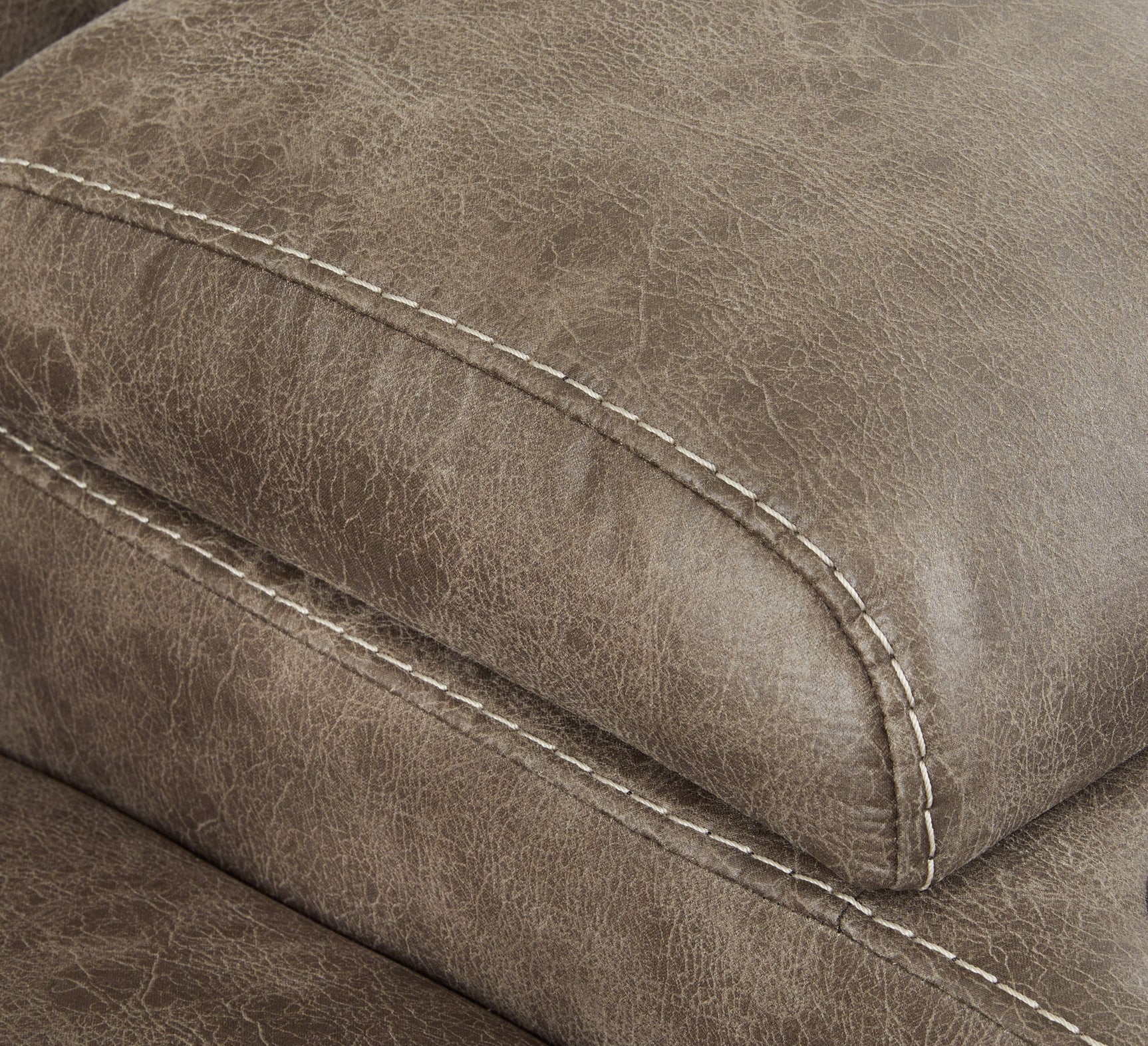 Jumbo stitching detail on Ravenel faux leather upholstery