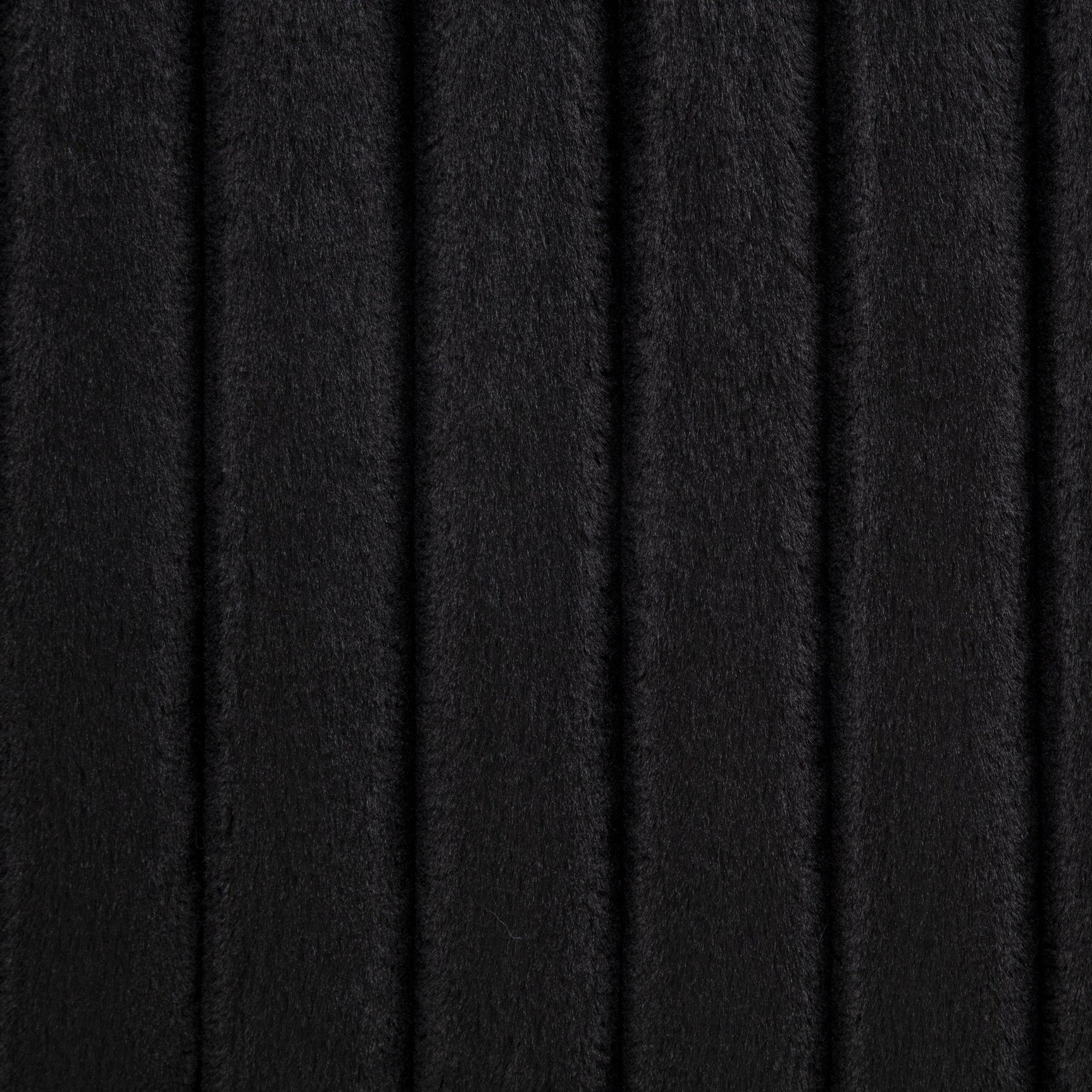 Armrest detail on Sarco corduroy chair