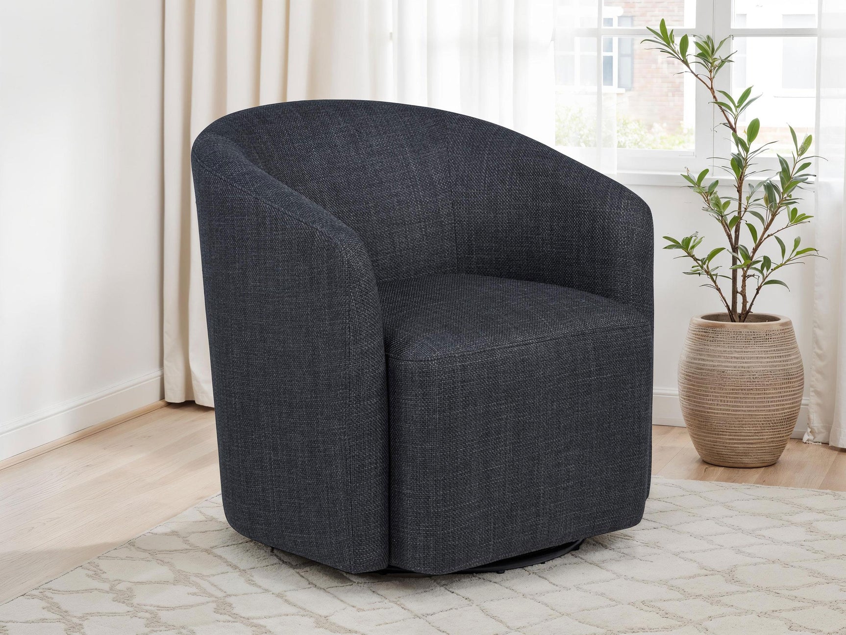 Side view of Mossbrook Anthracite Fabric Swivel Accent Chair