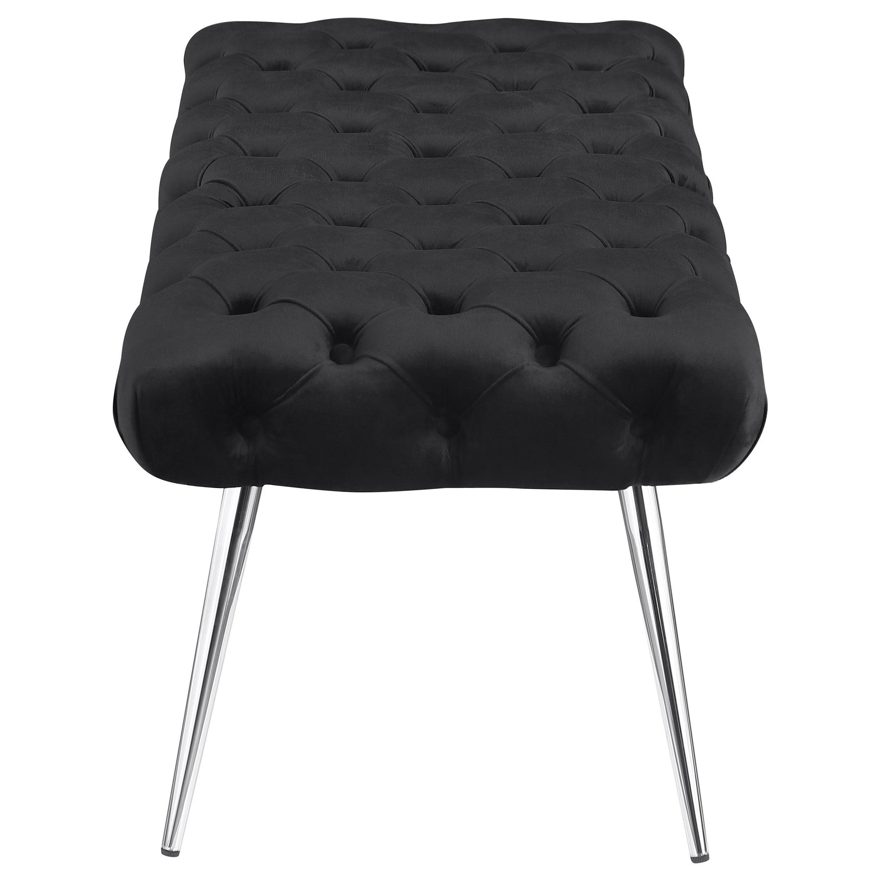 Close-up of stainless steel leg and upholstery