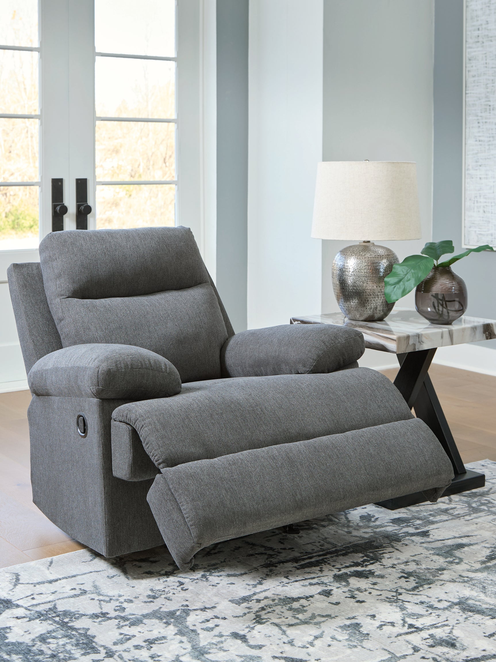 Reclined view of Side-Swipe Charcoal Chenille Recliner