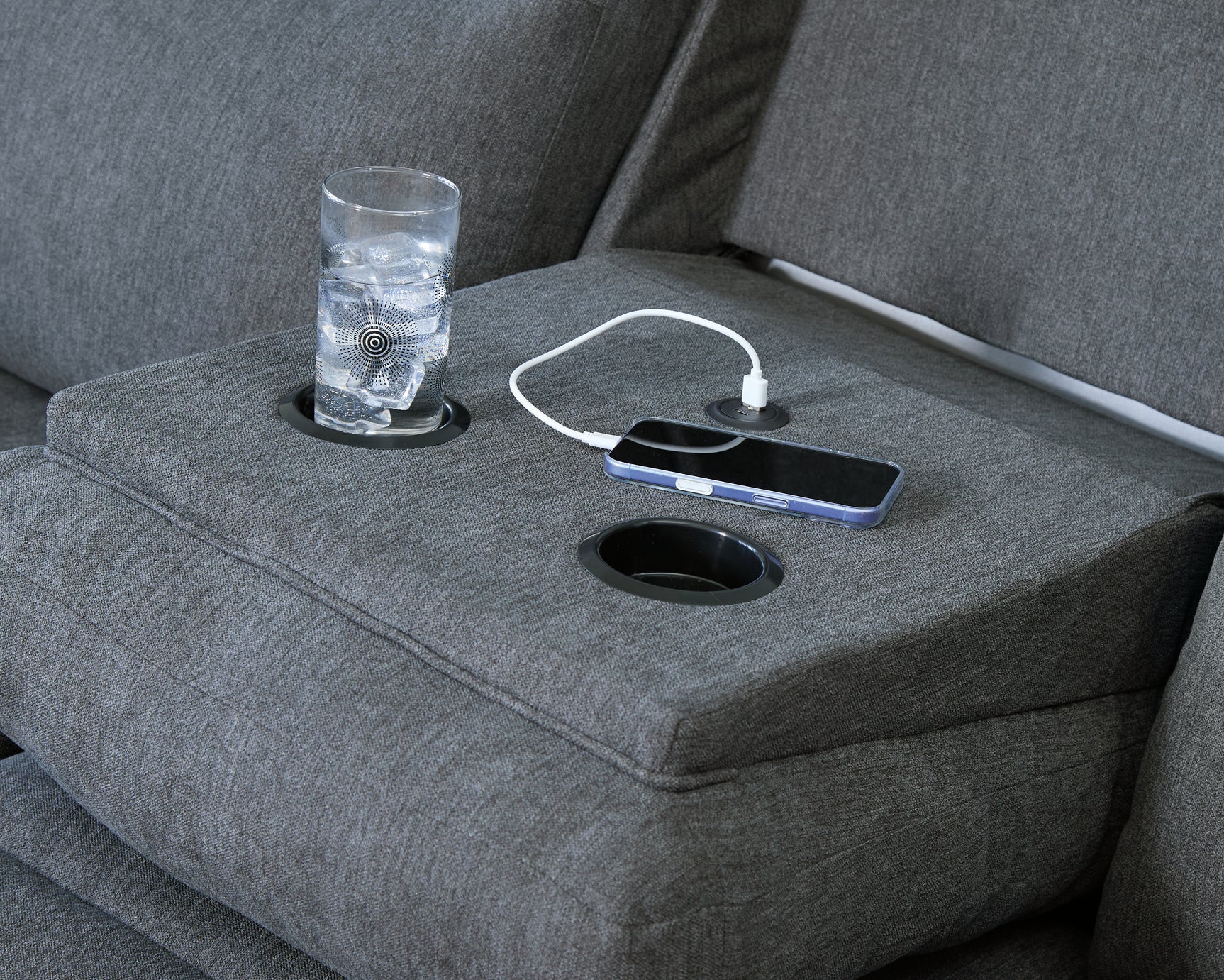 Close-up of drop-down table and cup holders