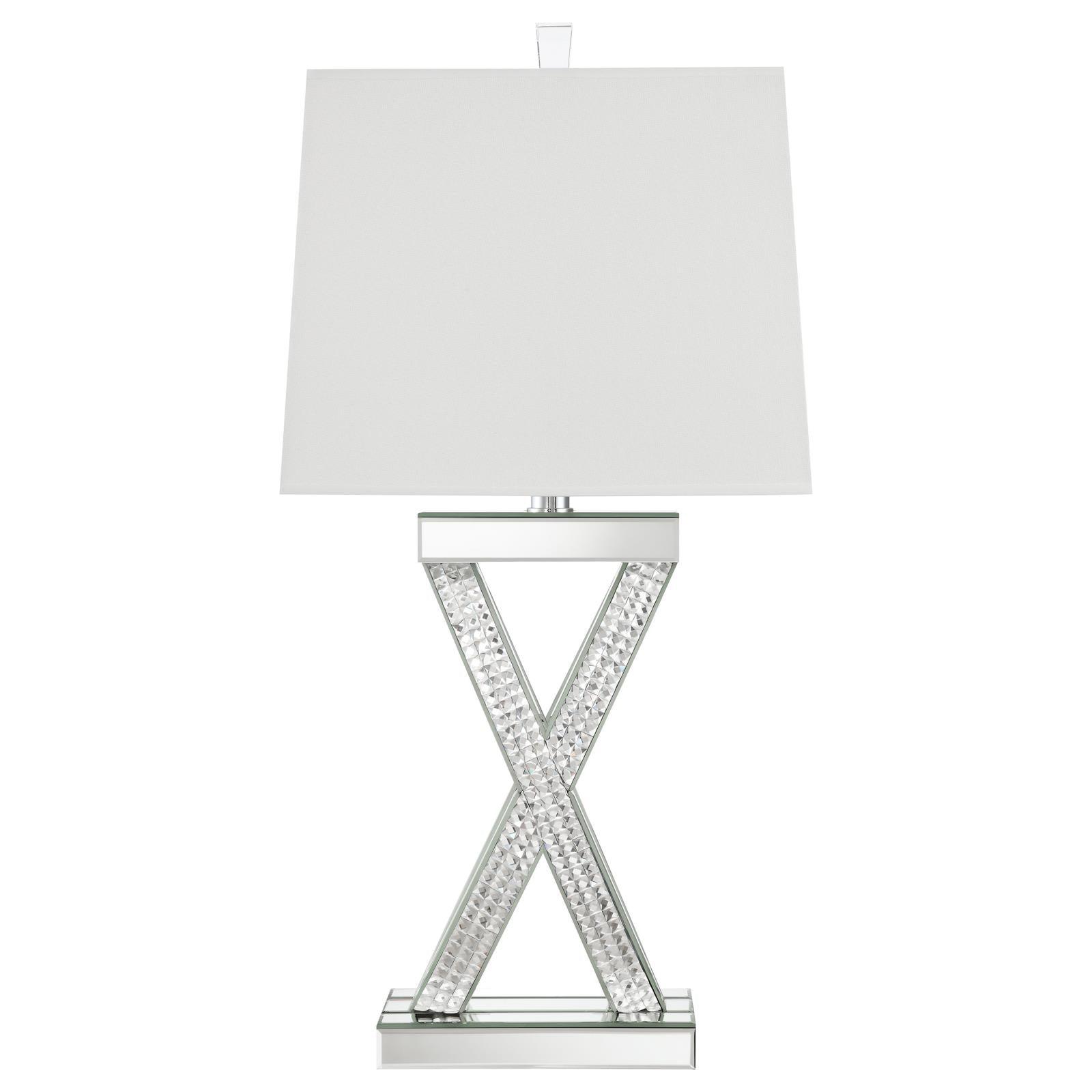 Close-up of Dominick table lamp's mirror tile base and acrylic finial