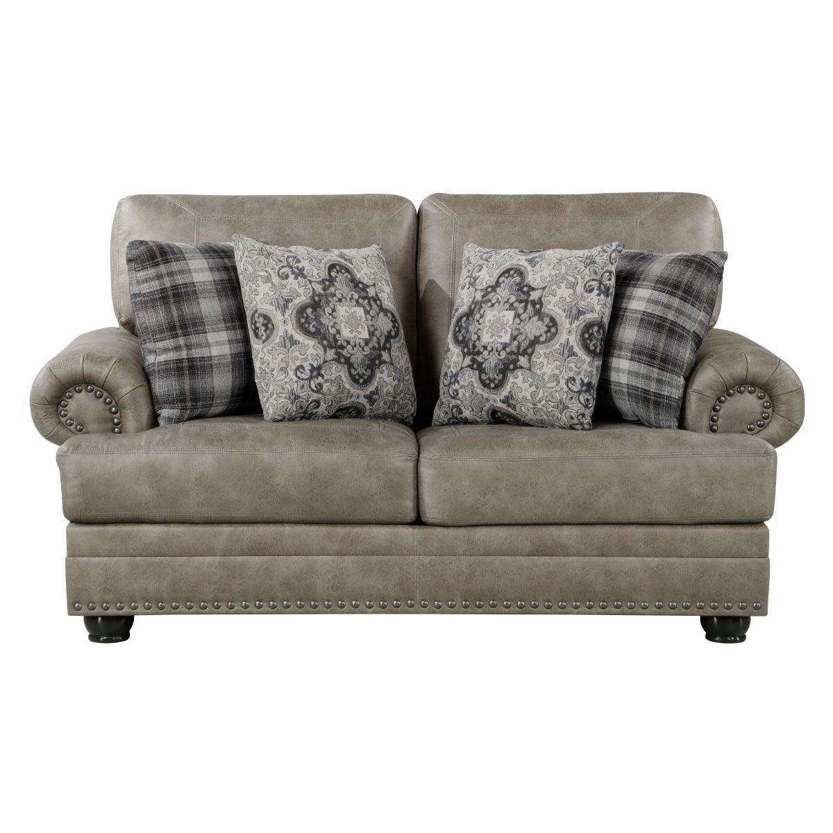 Gray tufted faux leather loveseat with pillows front view