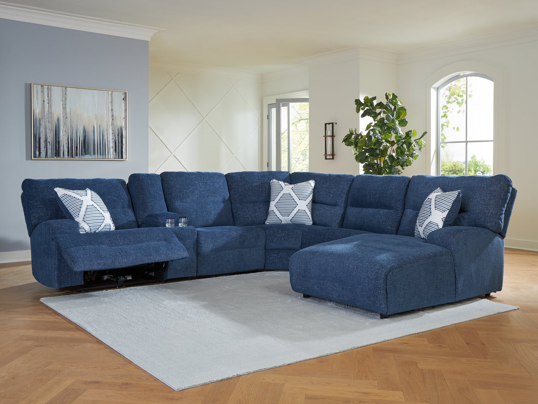 Sectional with accent pillows displayed from side angle
