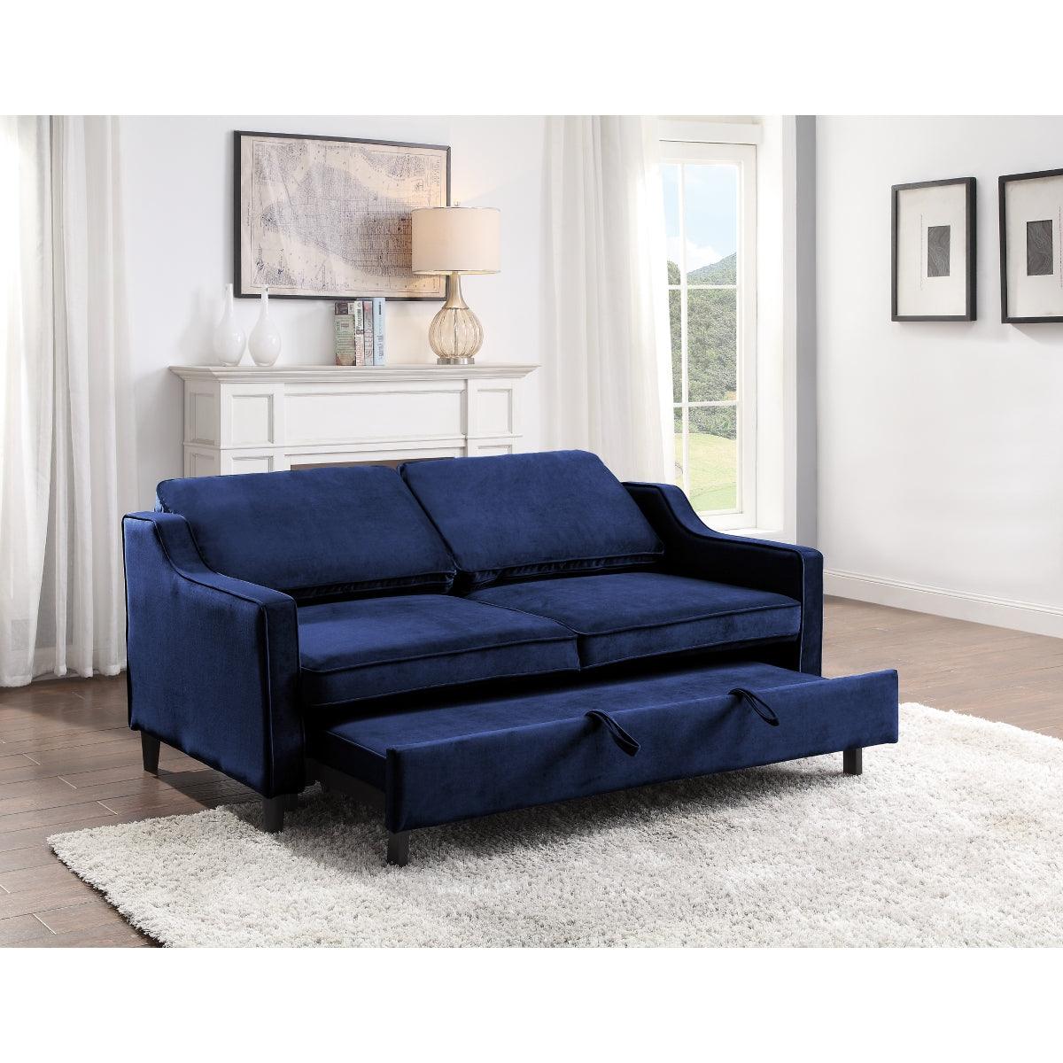 Opened pull-out bed on Adelia navy velvet sofa showing spacious sleeping area
